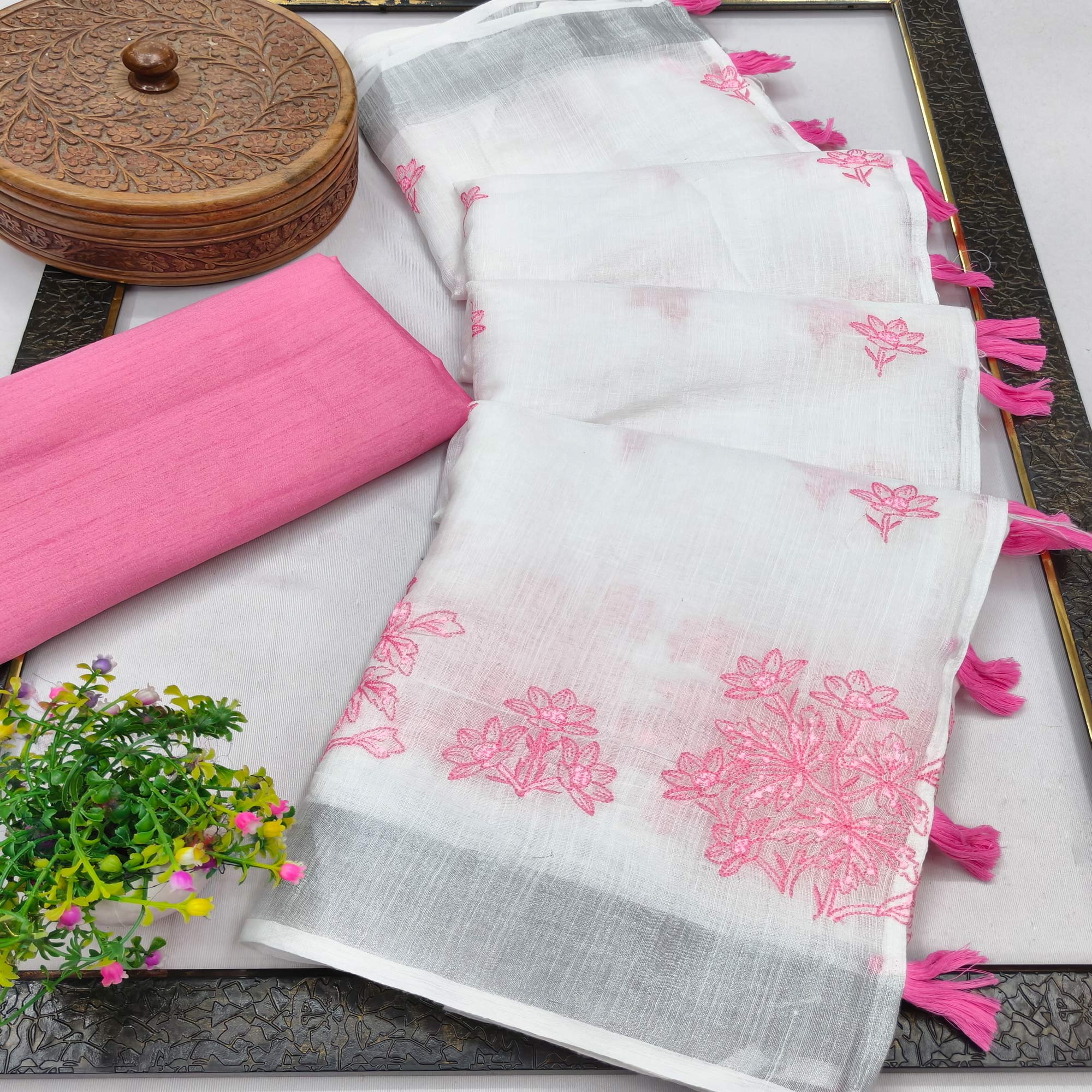 White & Baby pink Floral Embroidered Linen Saree Perfect for Festive Occasions