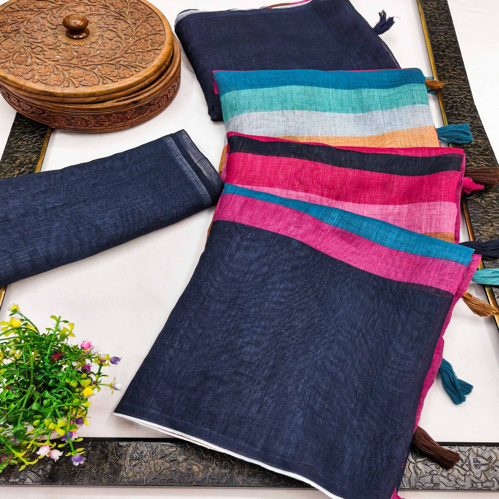 Navy Blue Linen Saree Designed with Modern Striped Prints and Trendy Tassel Detailing