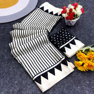 Party Perfect Off White & Black Saree Crafted in Cream Crepe Fabric with Striped Print