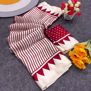 Party Perfect Off White & Pink Saree Crafted in Cream Crepe Fabric with Striped Print