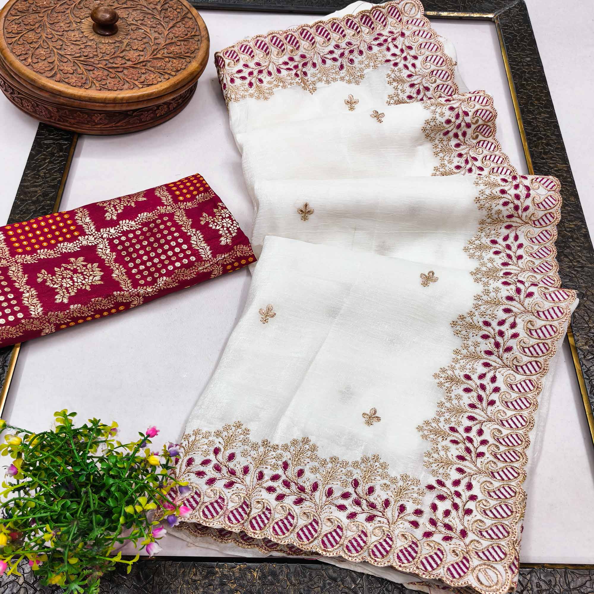 Charming White Floral Embroidered Chiffon Saree Enhanced With Intricate Paisley Border Design