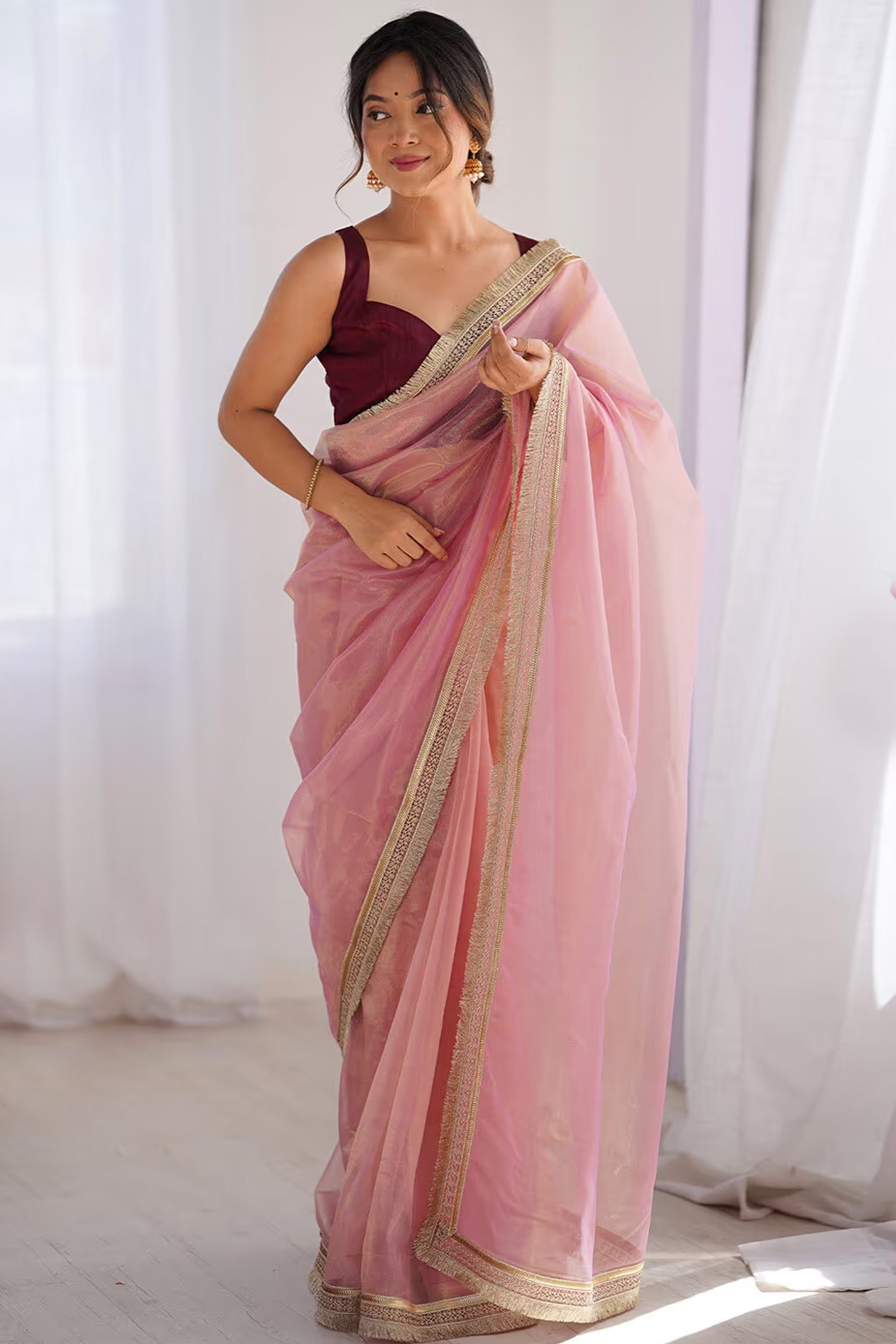 Feminine Rose Pink Solid Net Saree with Sophisticated Lace Border Work