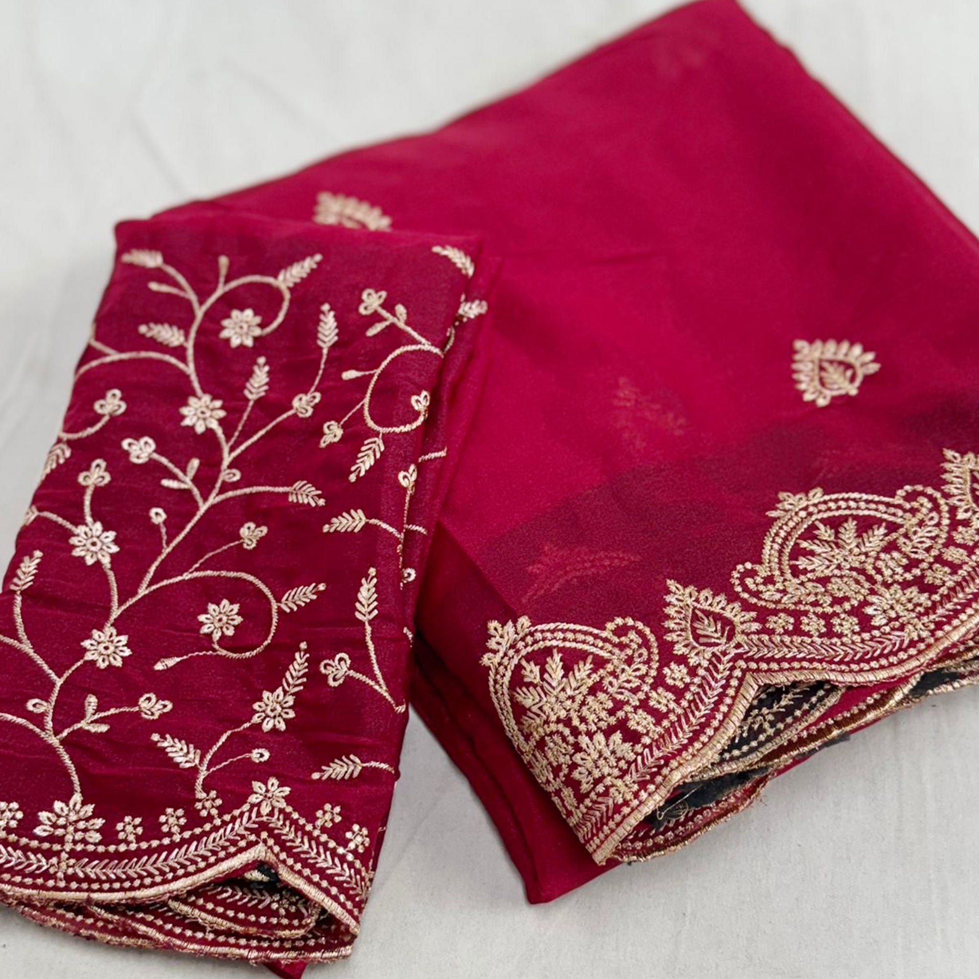 Gorgeous Pink Floral Embroidered Georgette Saree Accented With Luxurious Zari Work