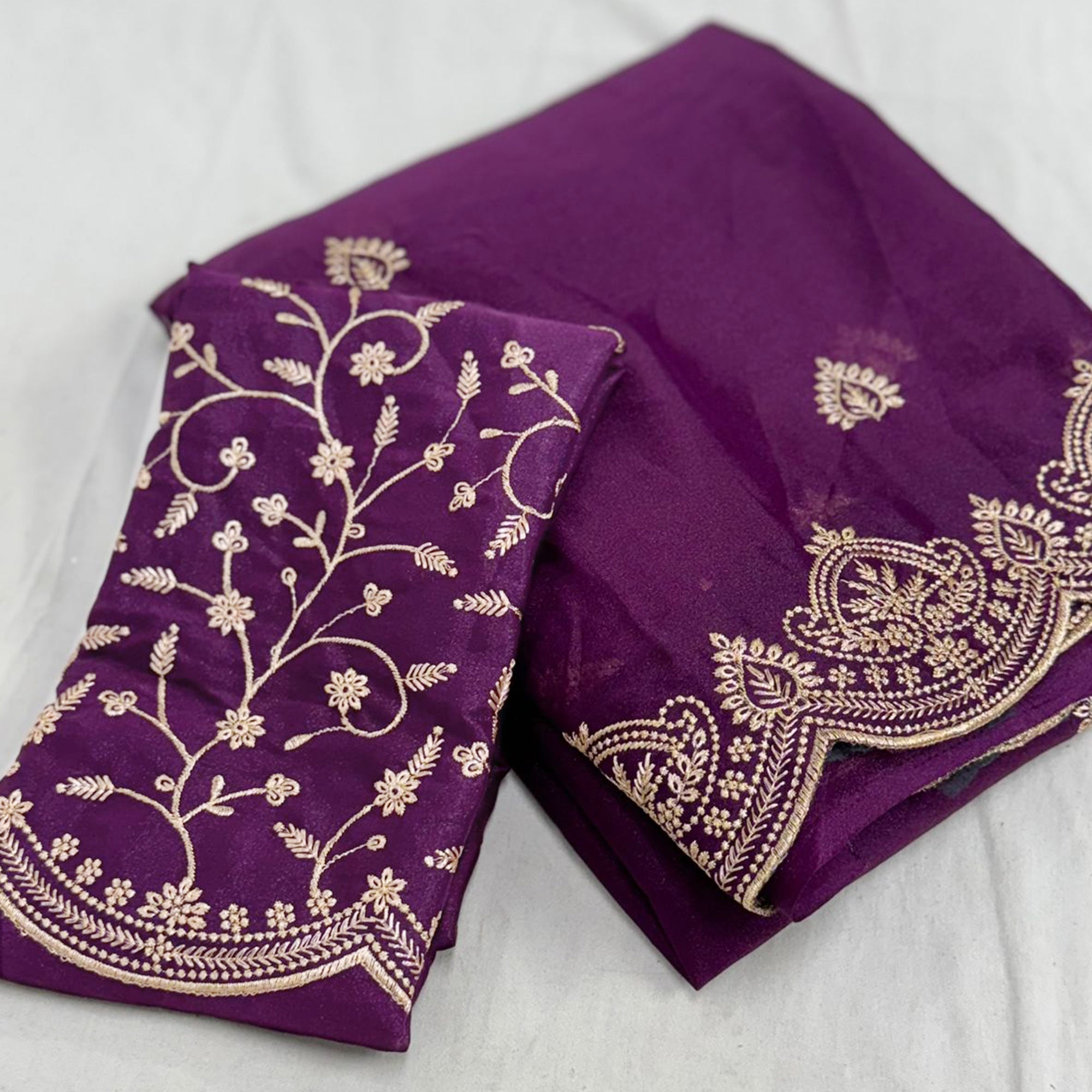 Gorgeous Purple Floral Embroidered Georgette Saree Accented With Luxurious Zari Work