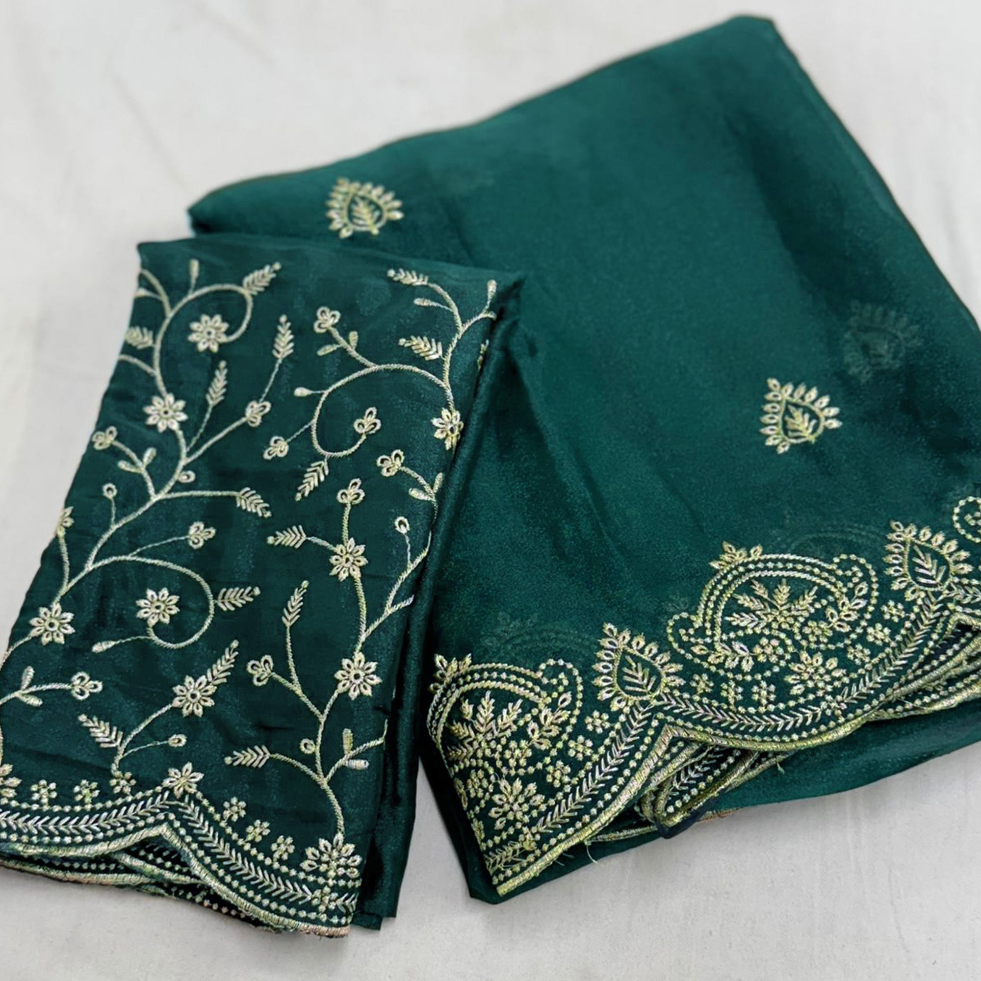 Gorgeous Teal Green Floral Embroidered Georgette Saree Accented With Luxurious Zari Work