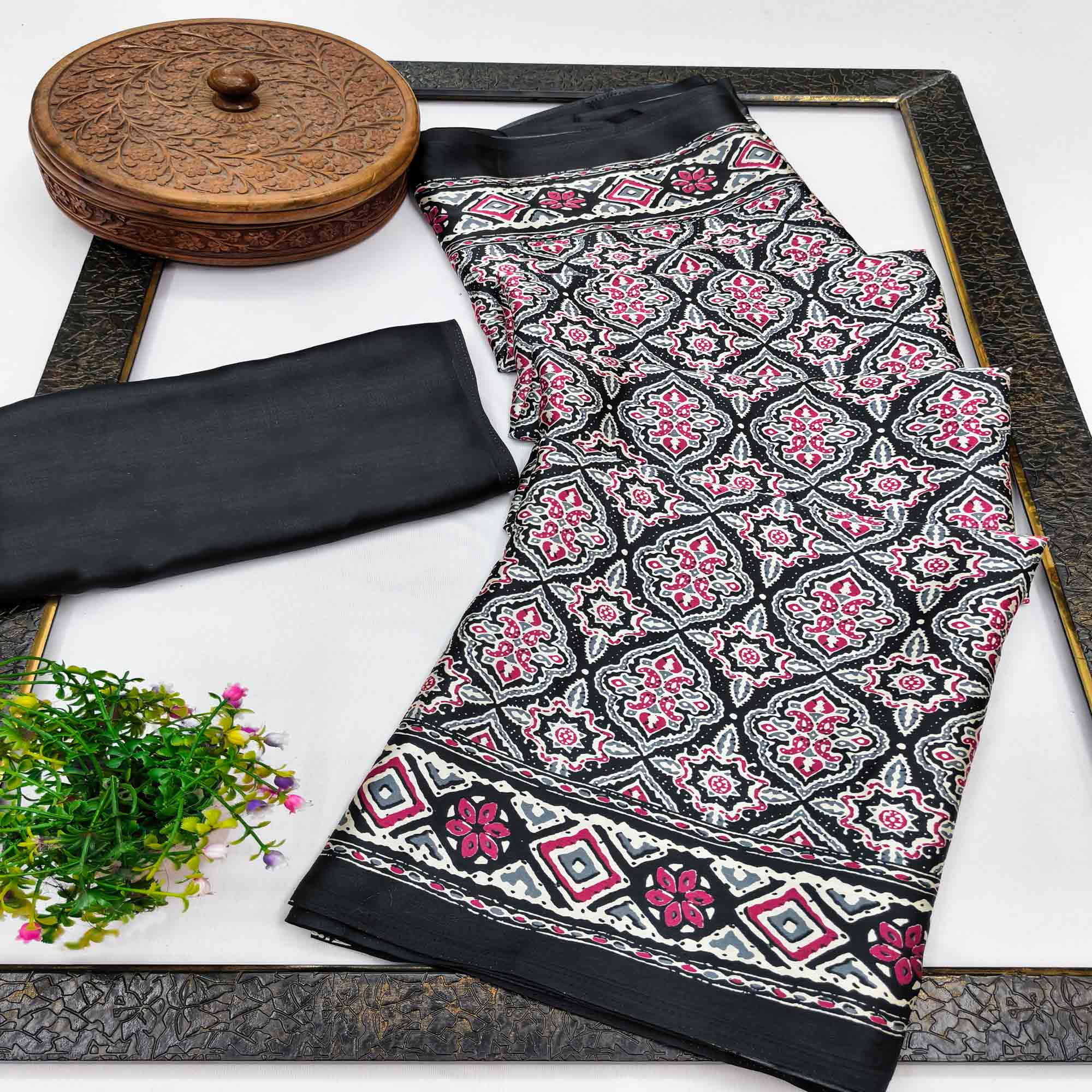 Charming Black Mill Printed Crepe Silk Saree Adorned With Vibrant Floral Design