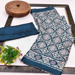 Charming Morpich Blue Mill Printed Crepe Silk Saree Adorned With Vibrant Floral Design