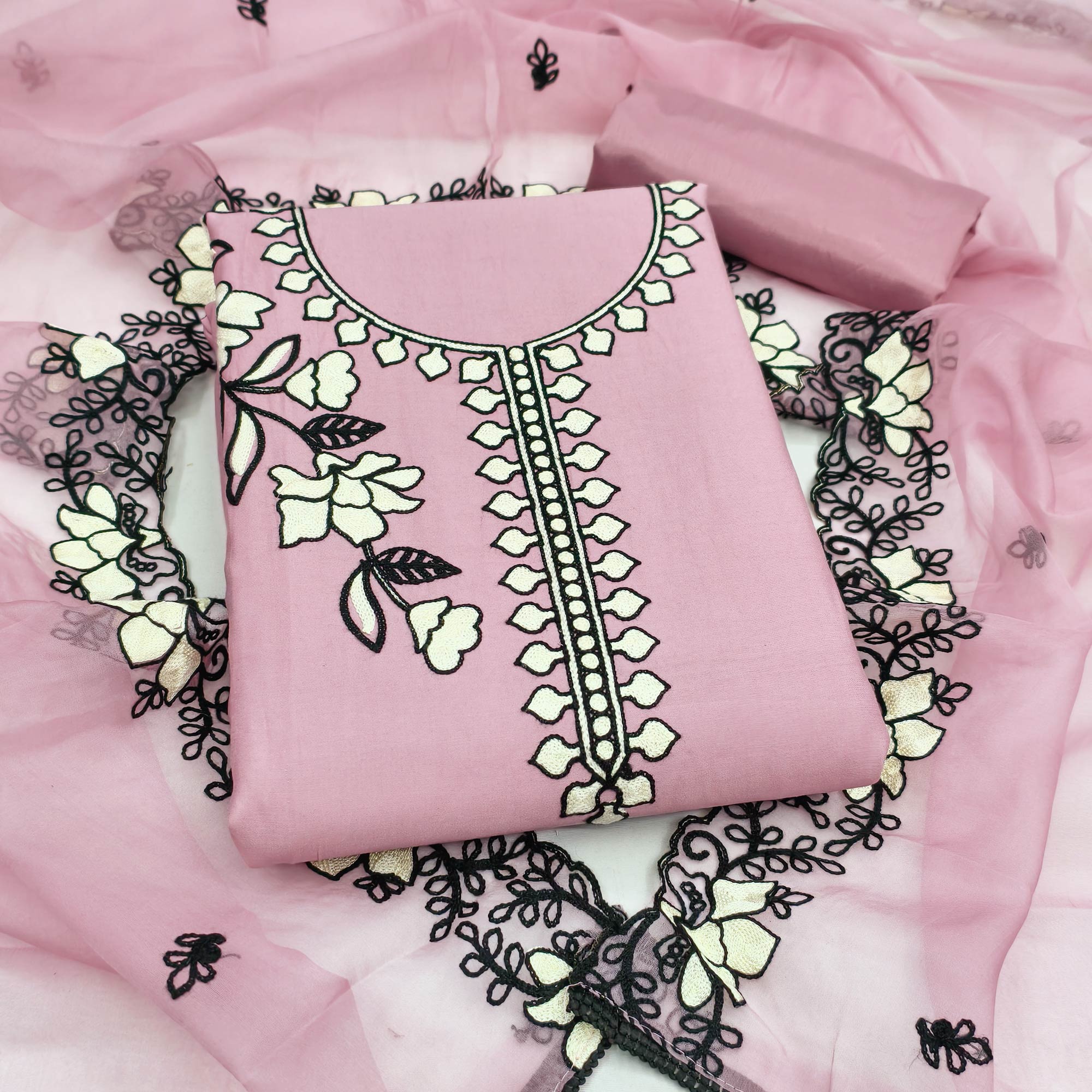 Graceful Onion Pink Floral Viscose Dress Material Enhanced With Intricate Thread Embroidery Work