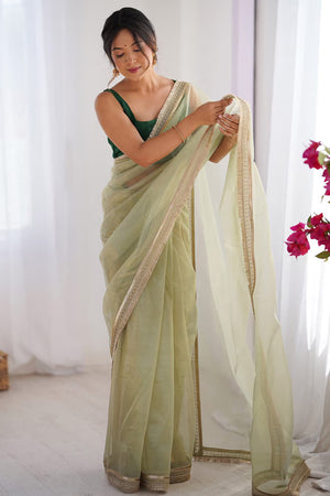 Green Solid Pattern Net Saree with Refined Lace Work for Parties