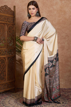 Cream & Black Modal Satin Saree Featuring a Solid Base and Artisanal Ajrakh Pallu
