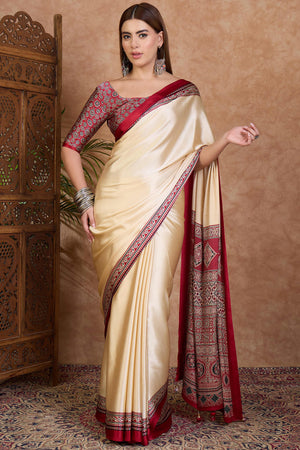 Cream & Red Modal Satin Saree Featuring a Solid Base and Artisanal Ajrakh Pallu