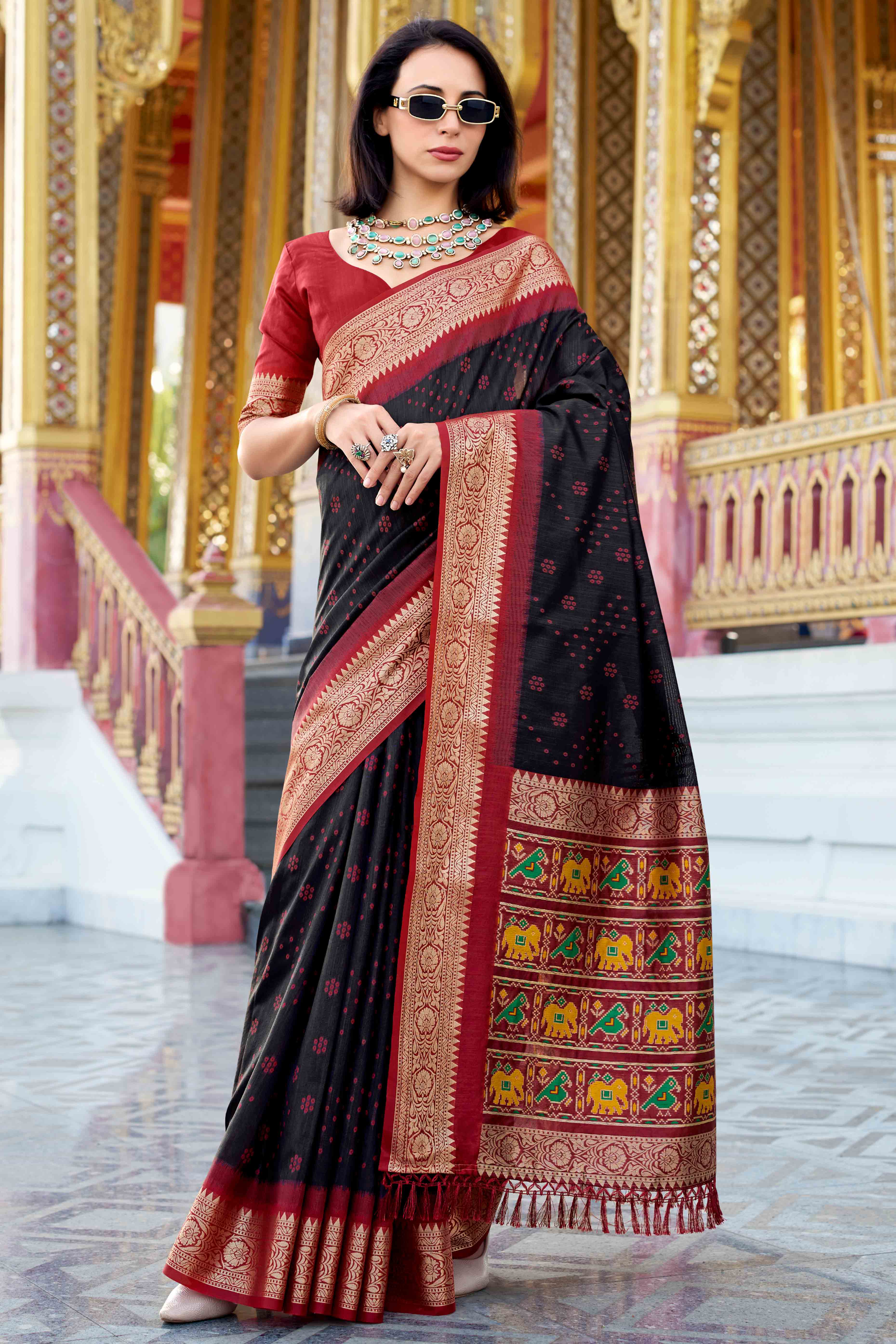 Silk Blend Woven Bandhani Saree In Black With Contrasting Patola Pallu