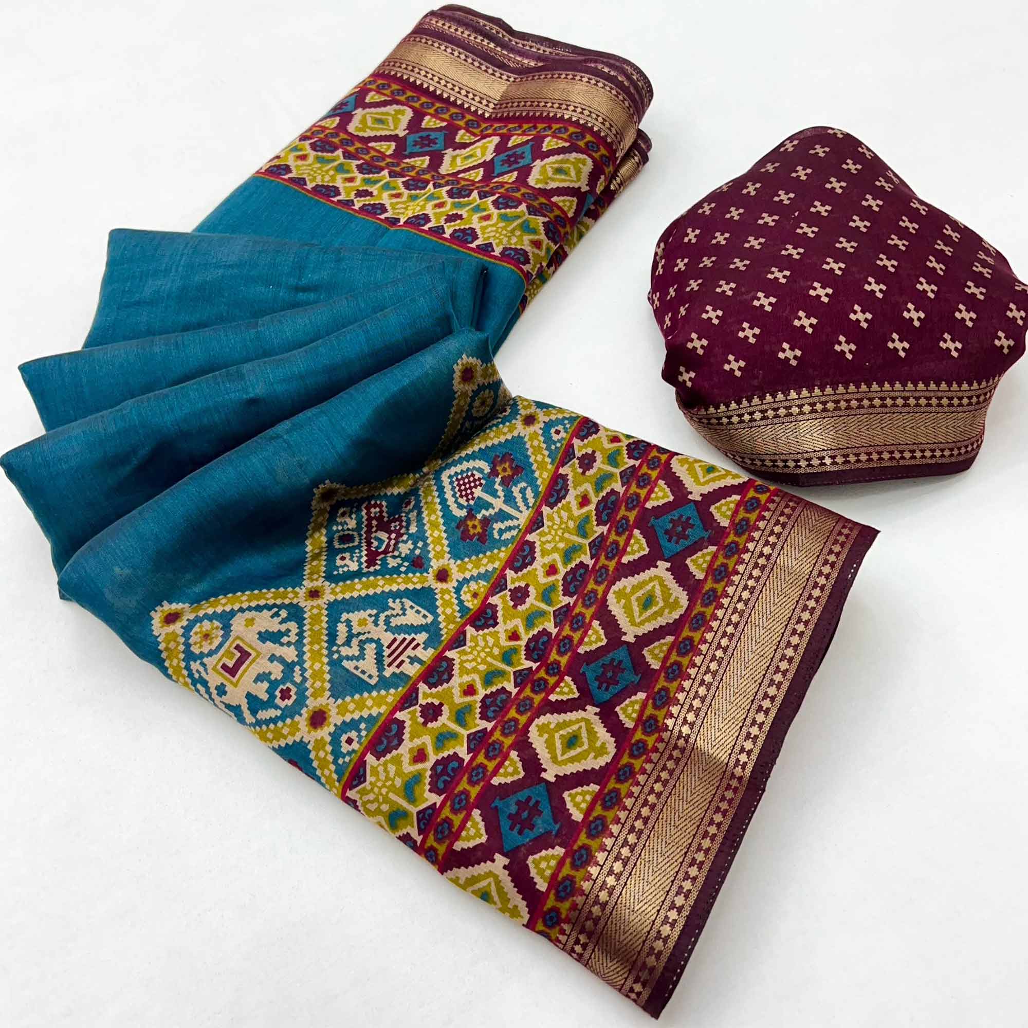 Teal Patola Print Saree in Featherlight Mulmul Cotton with Zari Border