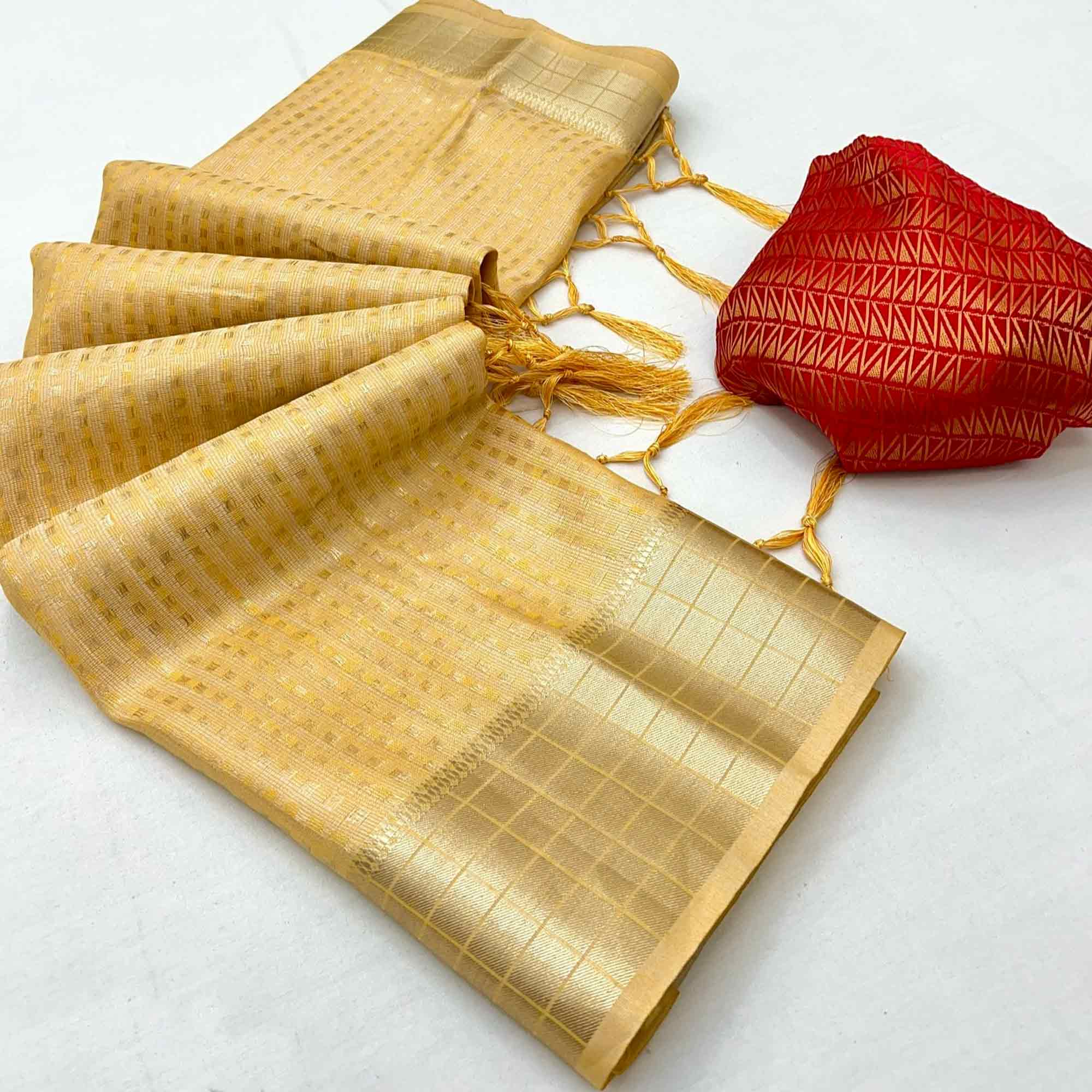 Yellow Soft Tissue Saree Featuring Rich Zari-Woven Detailing.