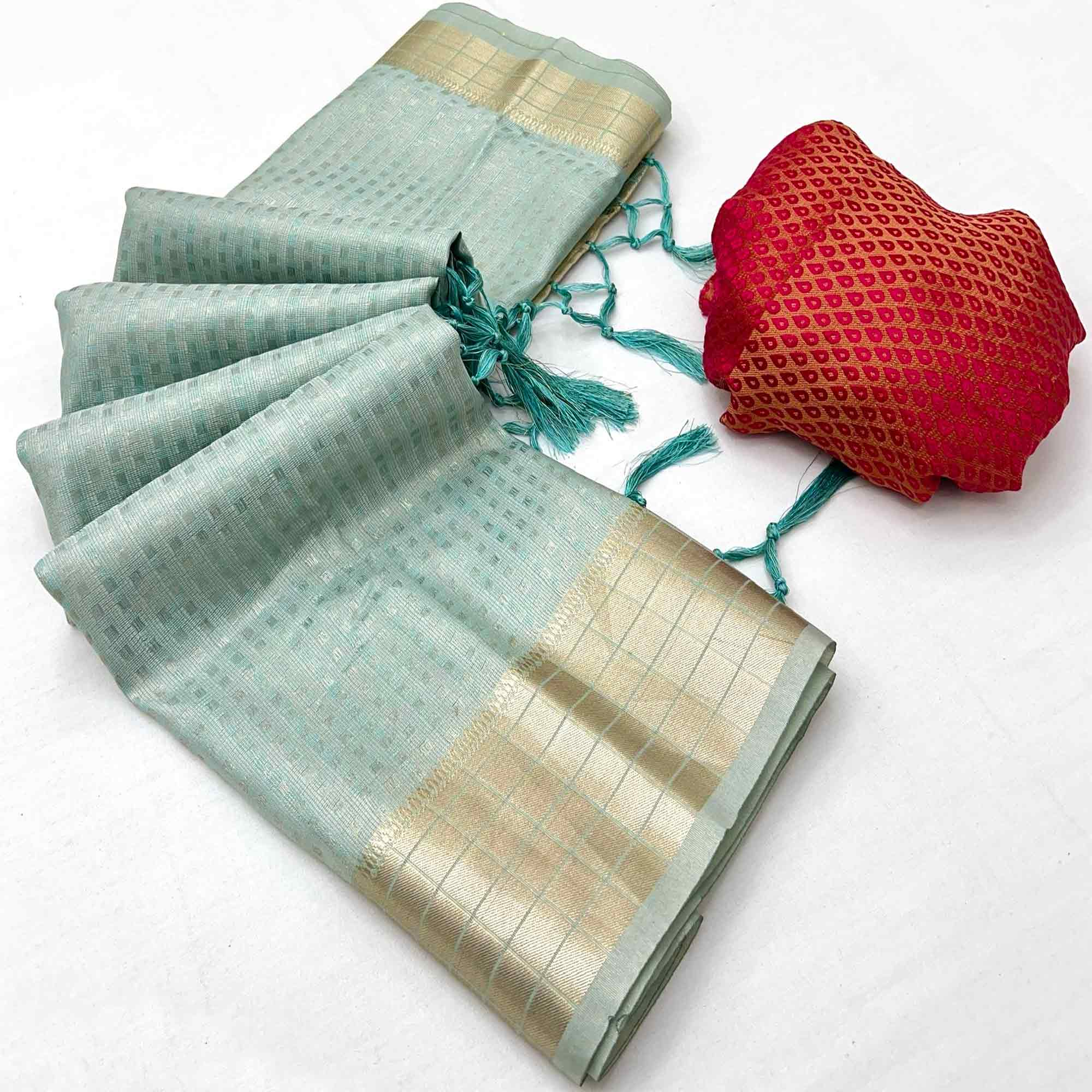 Sky Blue Soft Tissue Saree Featuring Rich Zari-Woven Detailing.
