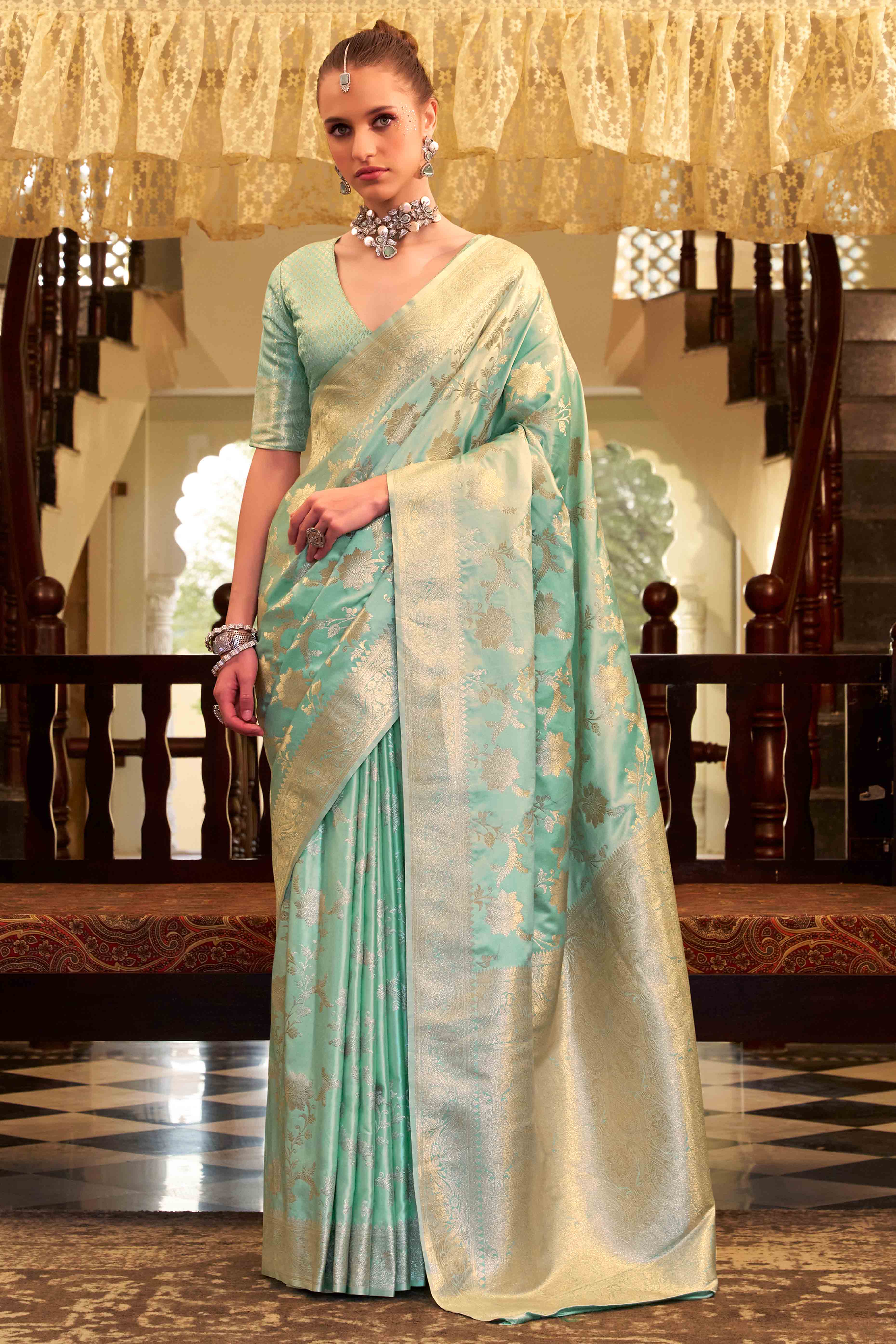 Mint Green Soft Satin Saree Featuring Exquisite Zari Weaving Work