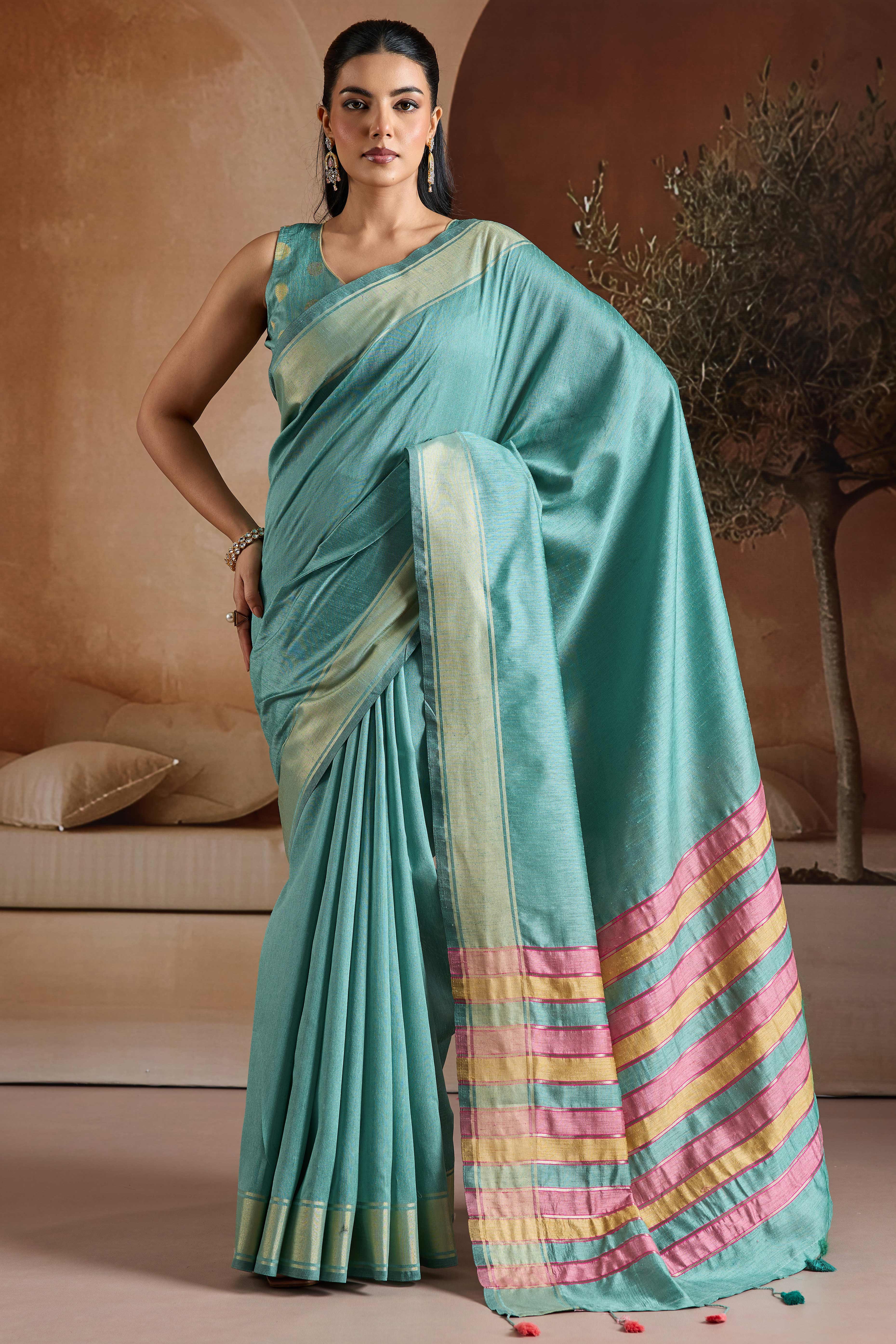 Graceful Turquoise Zari Woven Bhagalpuri Silk Saree Accented With Tassel Pallu