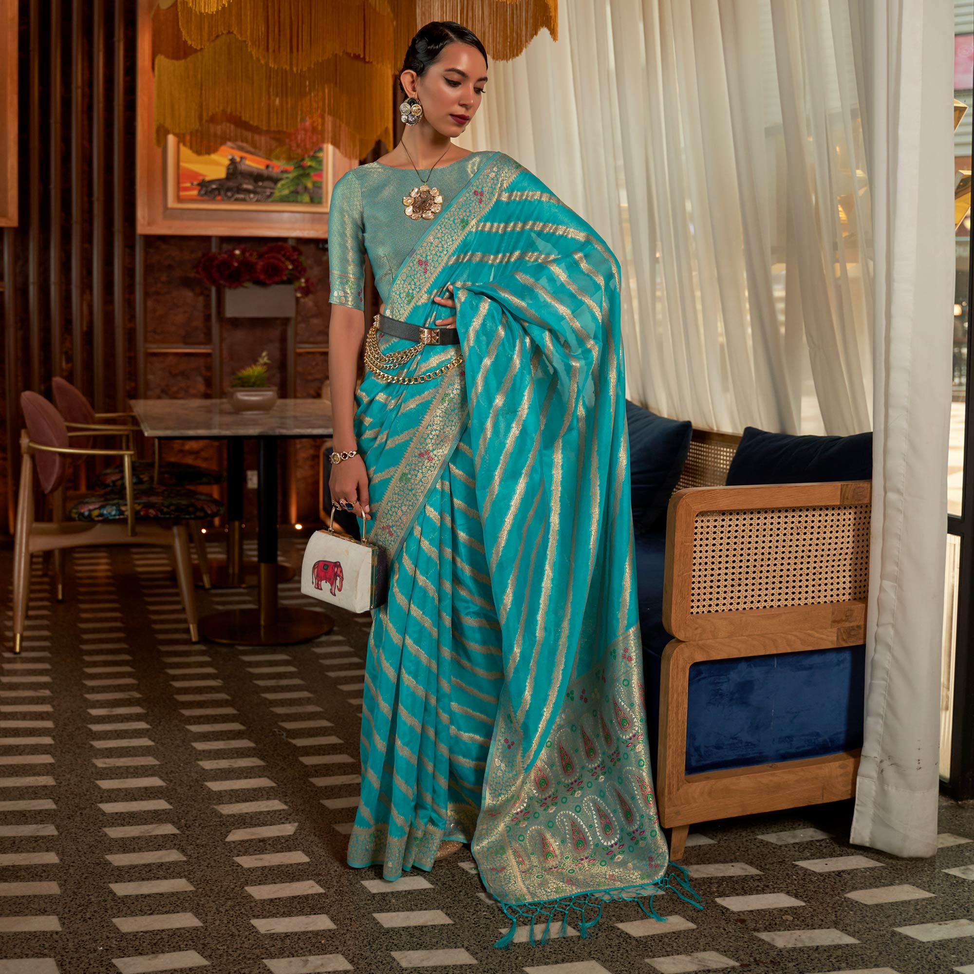 Rama Blue Woven Organza Saree With Tassels