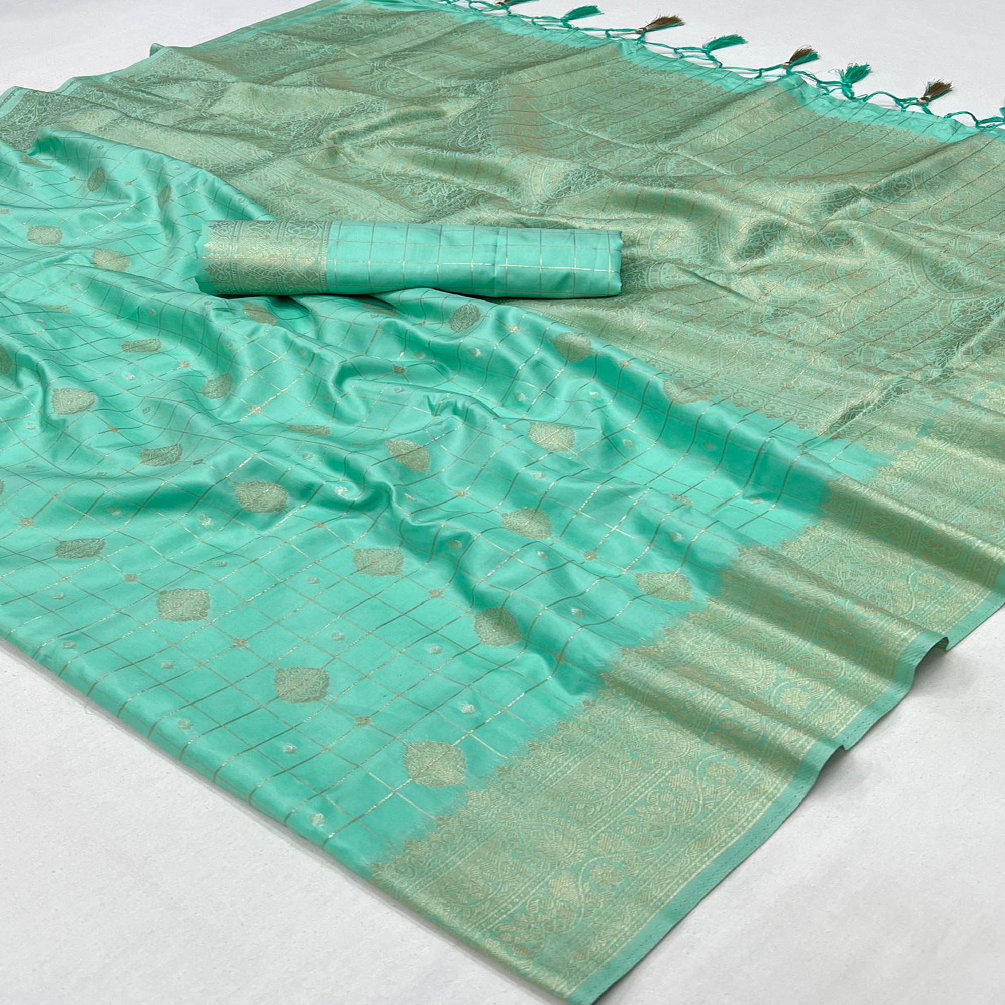 Turquoise Woven Art Silk Saree With Tassels