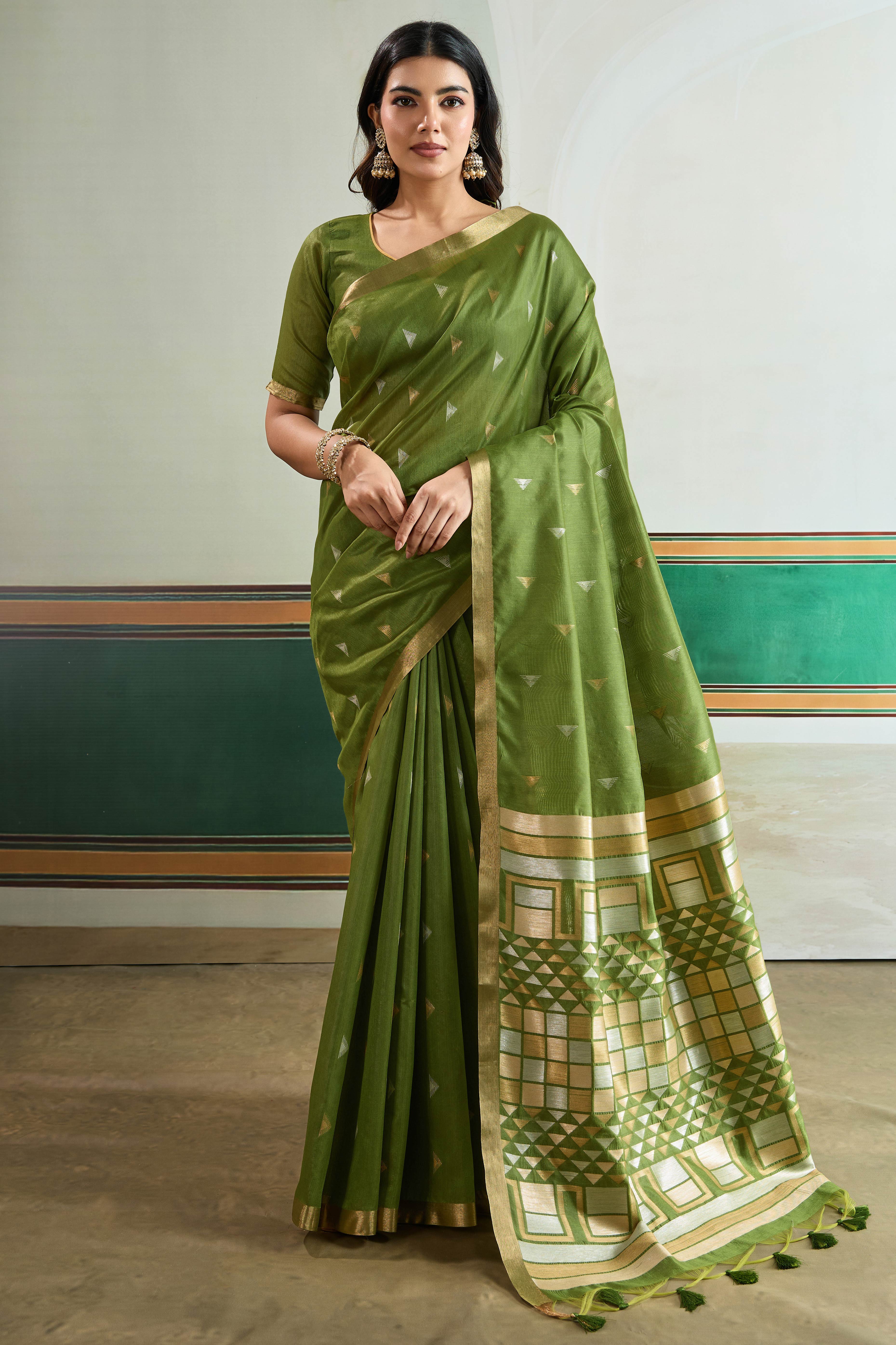 Classic Green Tussar Silk Saree Showcasing Rich Geometric Weaving & Trendy Tassel Pallu