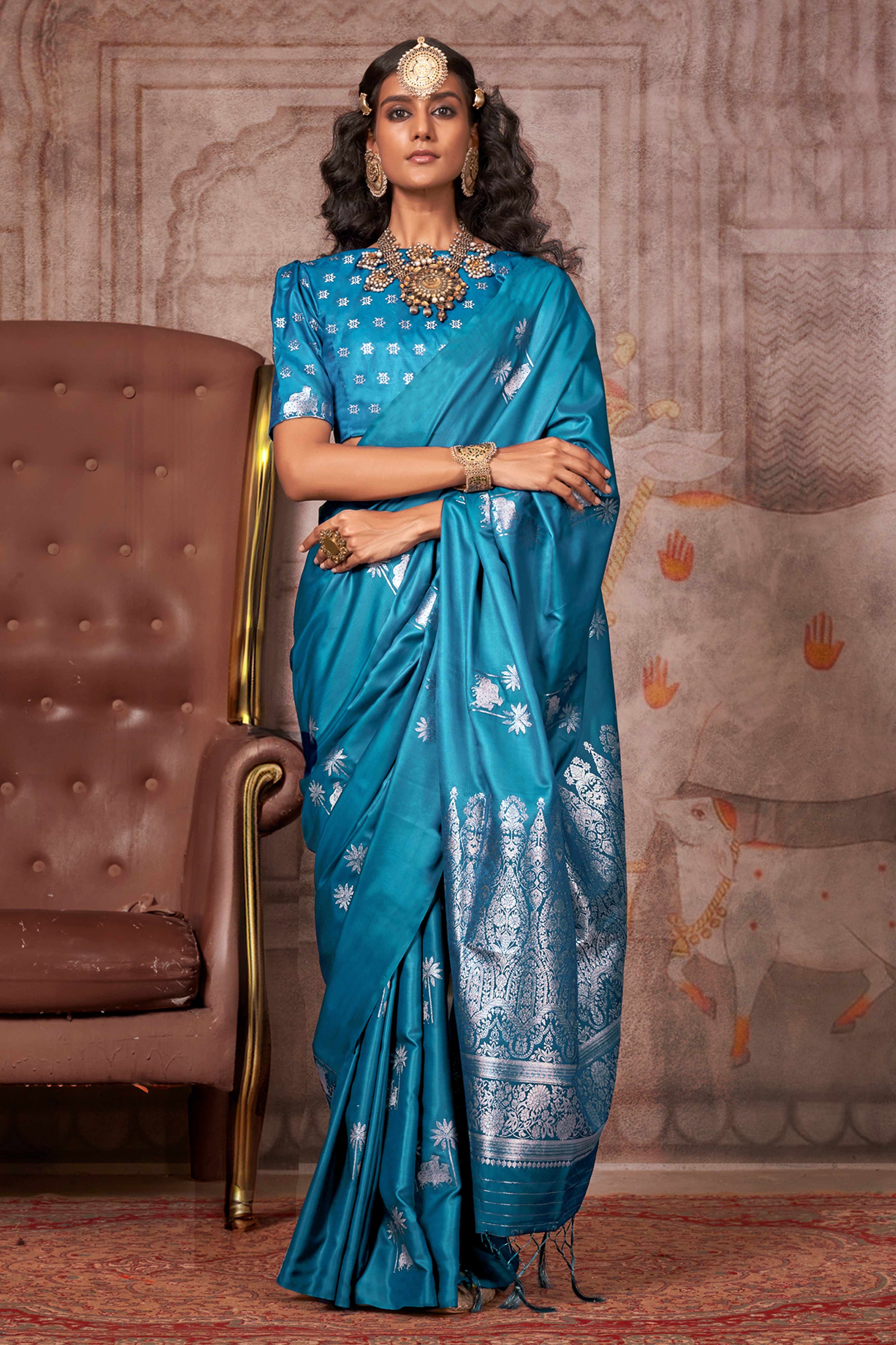 Morpich Blue Satin Silk Saree with Exquisite Floral Zari Weaving & Graceful Tassel Detailing