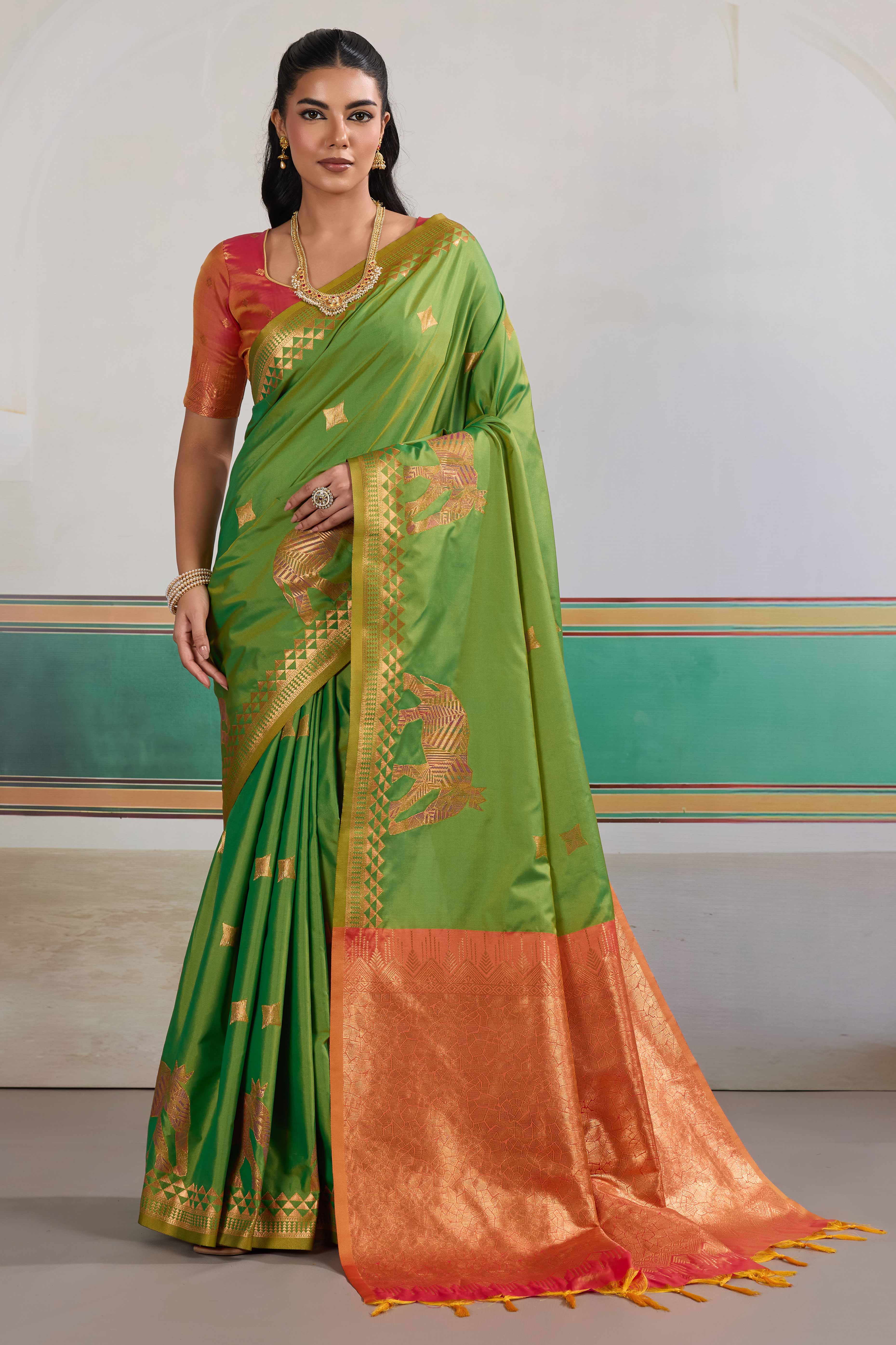 Traditional Parrot Green Pure Silk Saree Featuring Elephant Motif Zari Weaving & Tassel Pallu