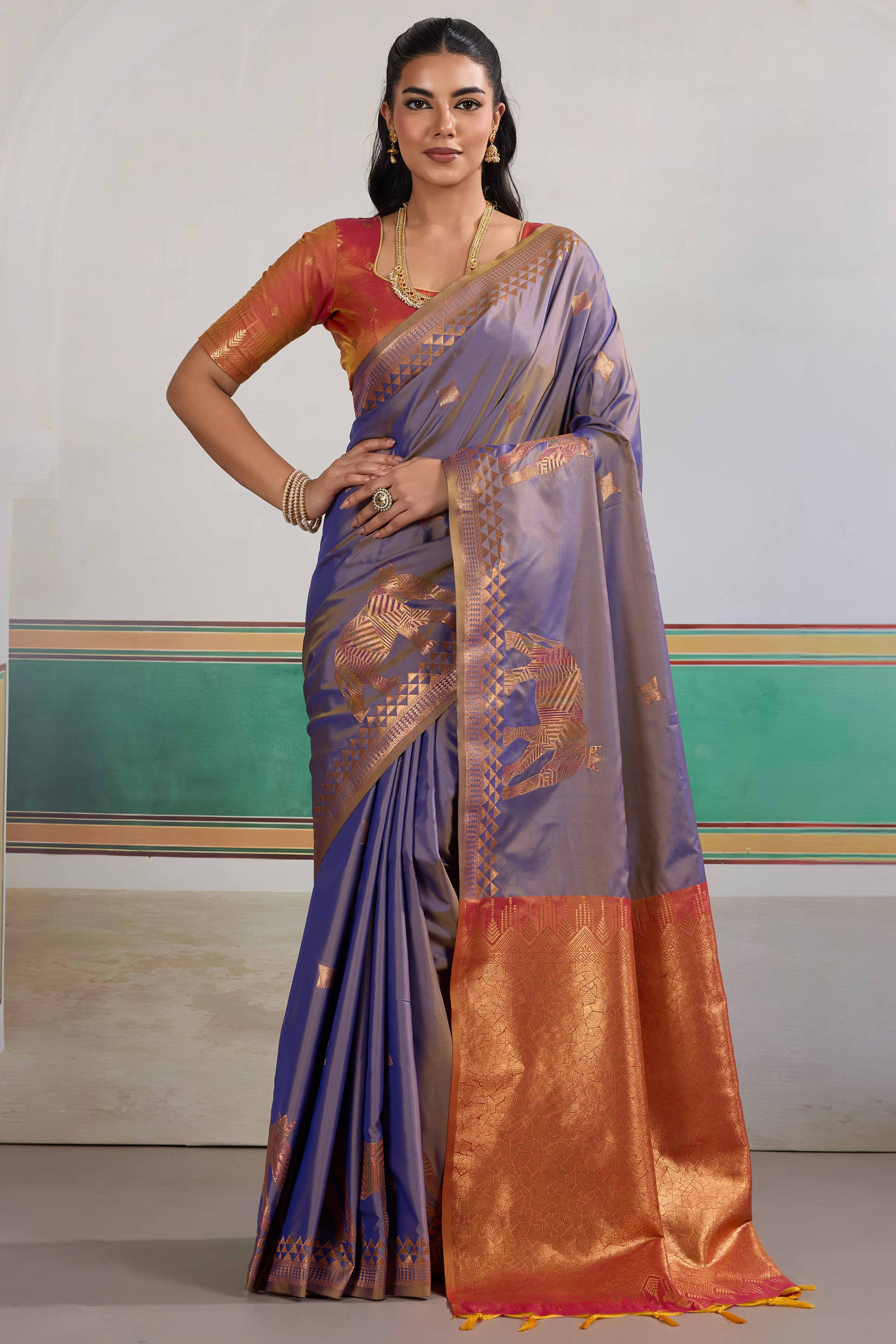Traditional Lavender Pure Silk Saree Featuring Elephant Motif Zari Weaving & Tassel Pallu