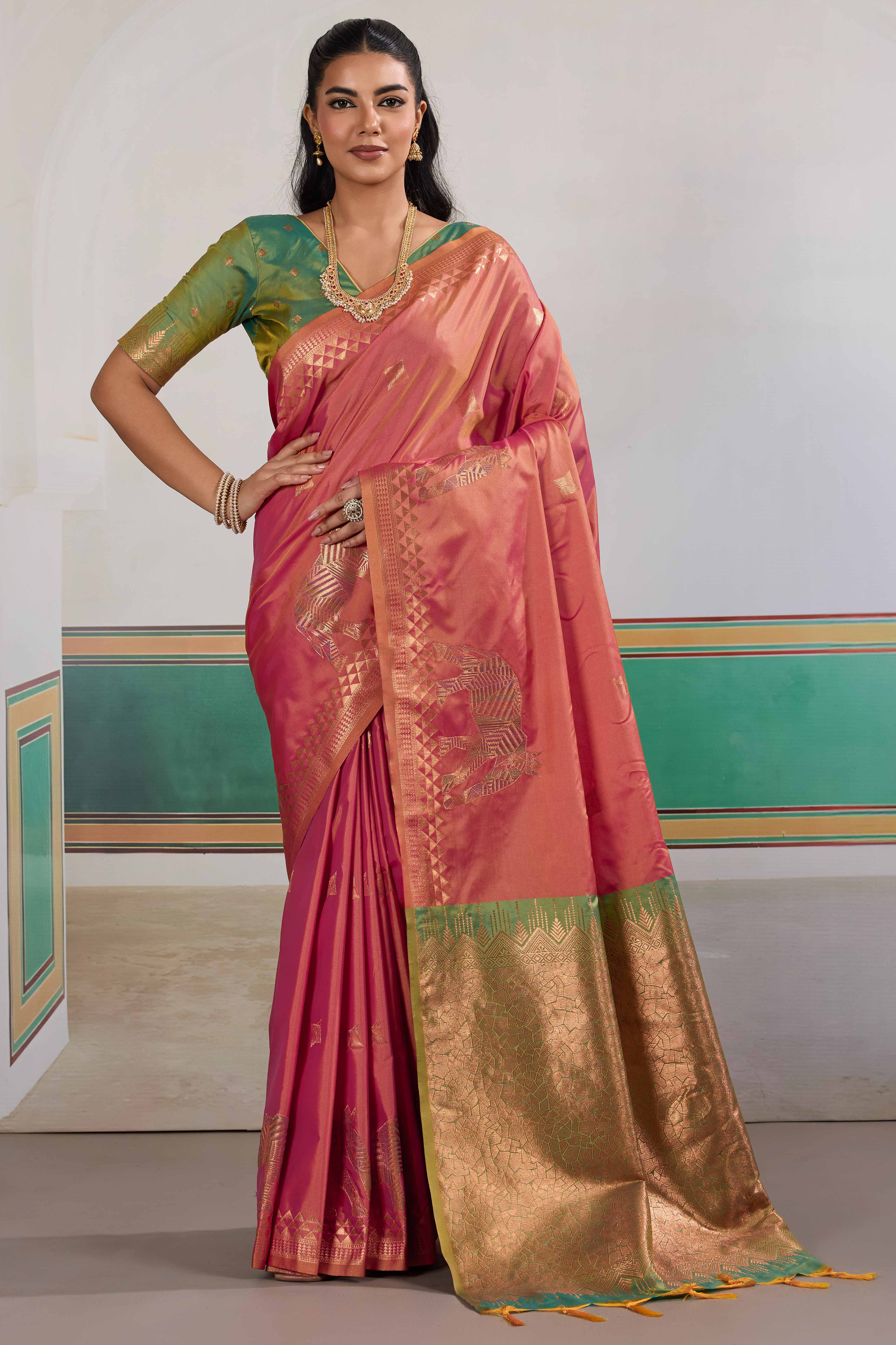Traditional Rose Pink Pure Silk Saree Featuring Elephant Motif Zari Weaving & Tassel Pallu
