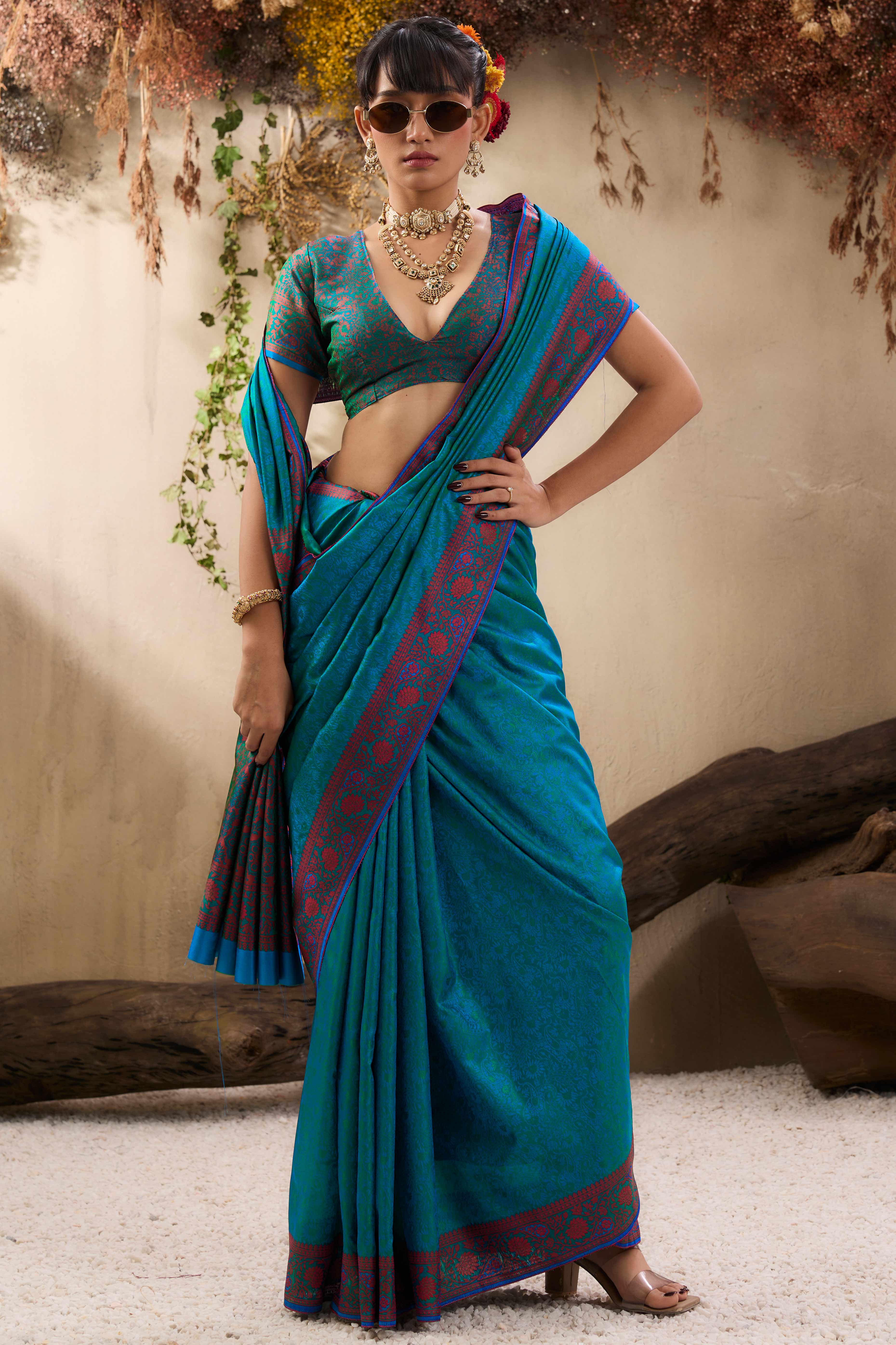 Teal Pure Silk Kanjivaram Handloom Saree Enhanced with Zari Woven Patterns