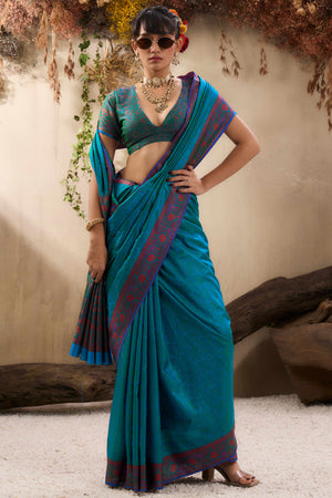 Teal Pure Silk Kanjivaram Handloom Saree Enhanced with Zari Woven Patterns