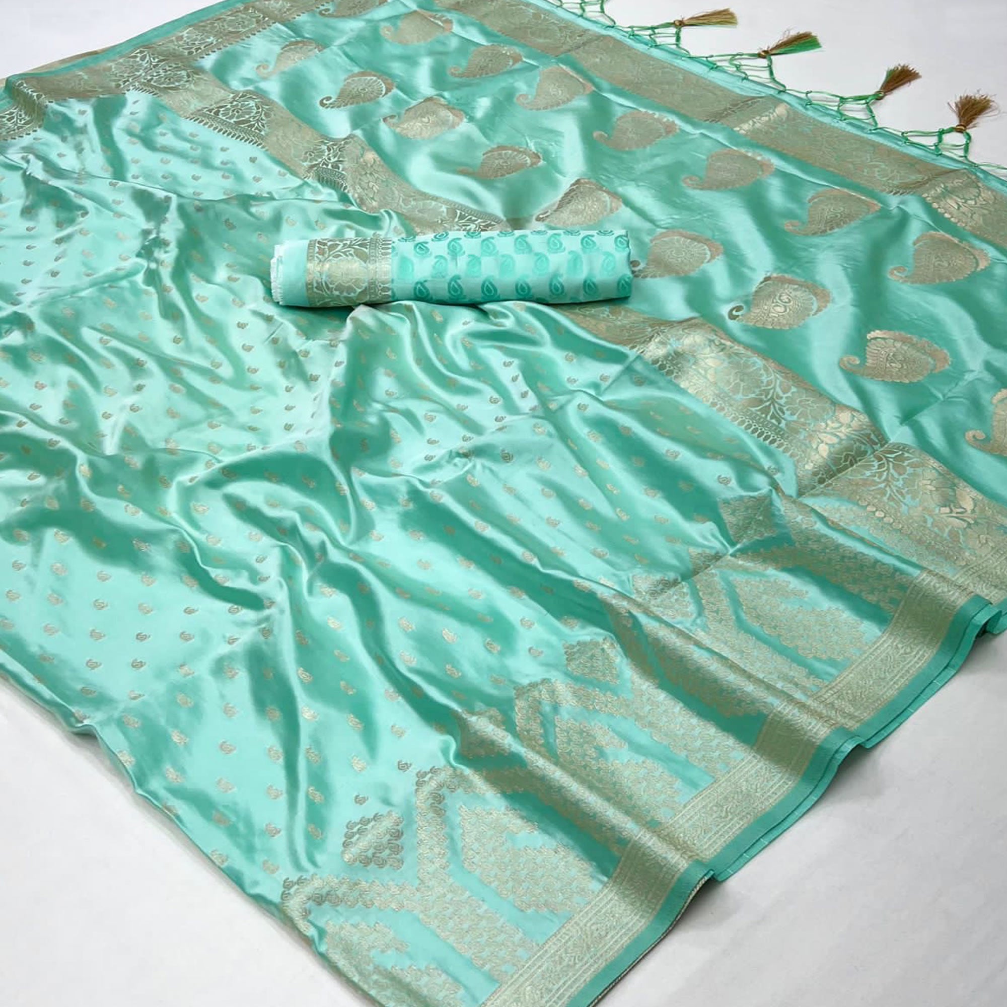 Sea Green Woven Satin Saree With Tassels