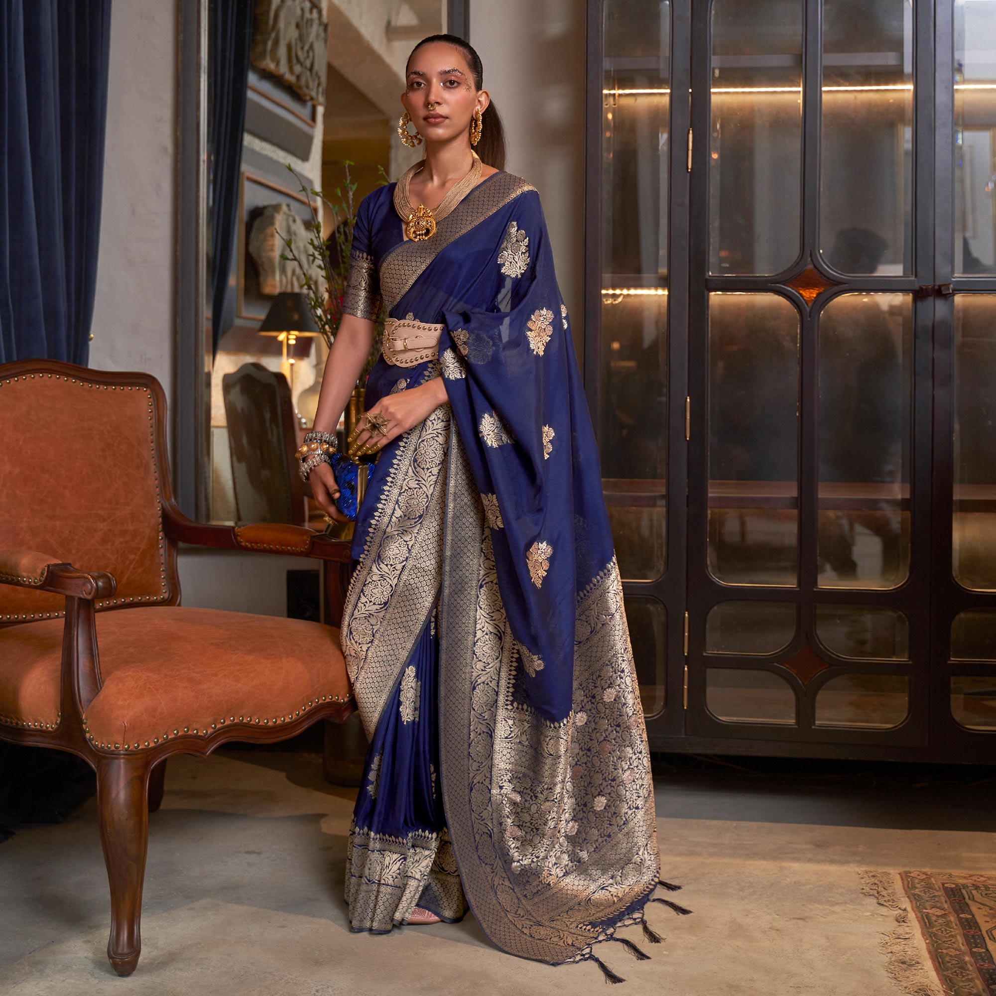 Navy Blue Woven Georgette Saree With Tassels