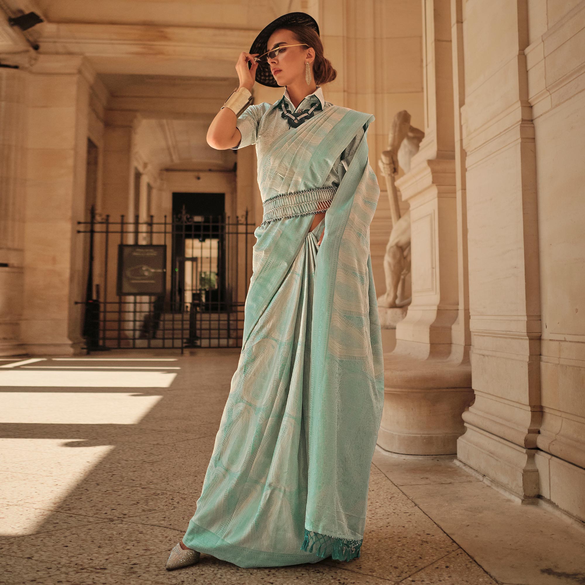 Turquoise Woven Satin Saree With Tassels