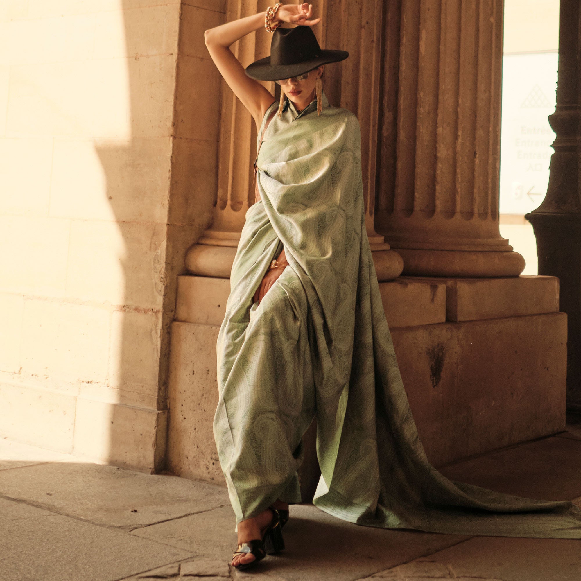 Green Woven Satin Saree With Tassels