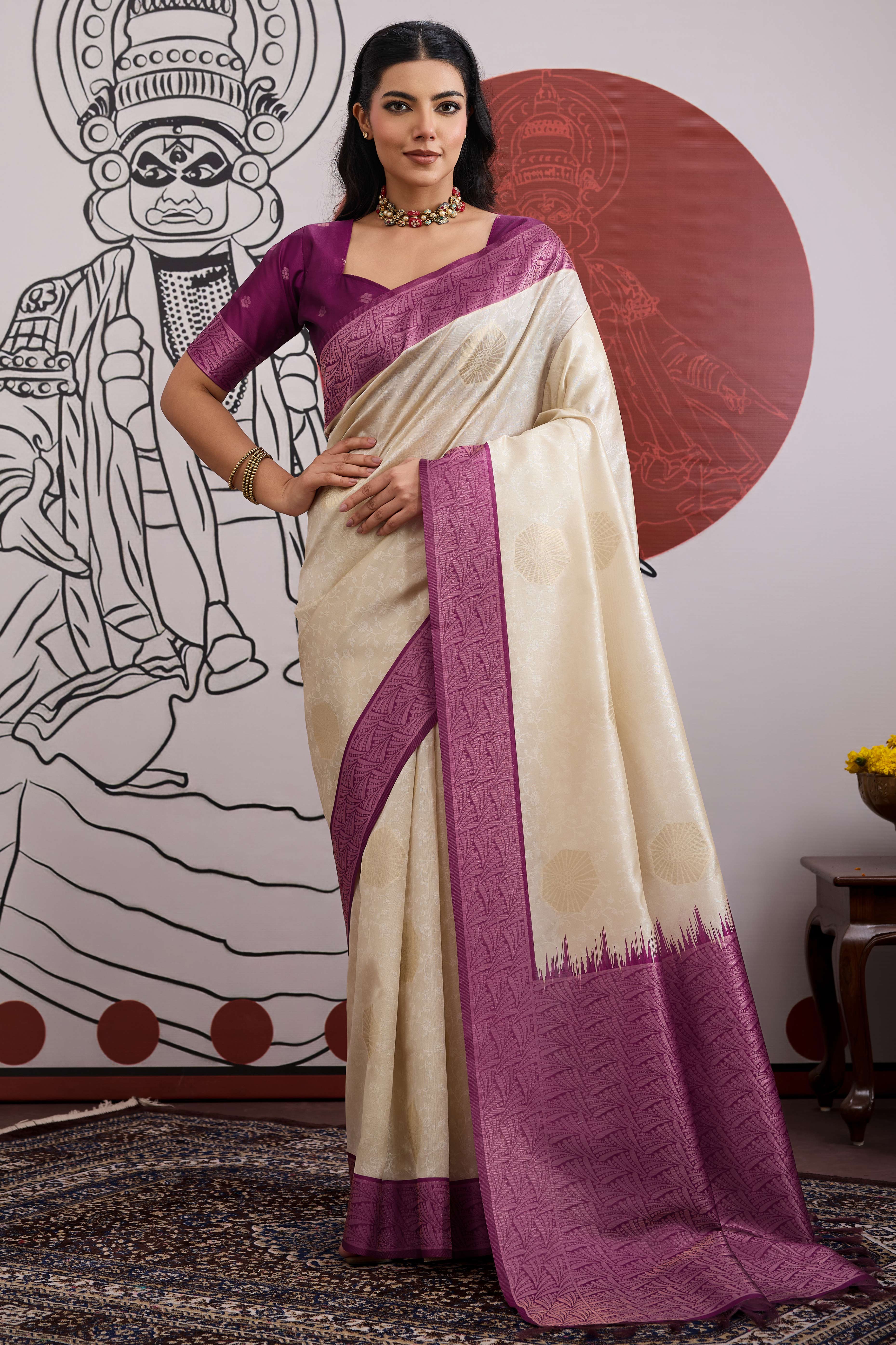 Graceful Cream & Purple Zari Weaving Silk Saree Highlighted By Decorative Tassel Pallu
