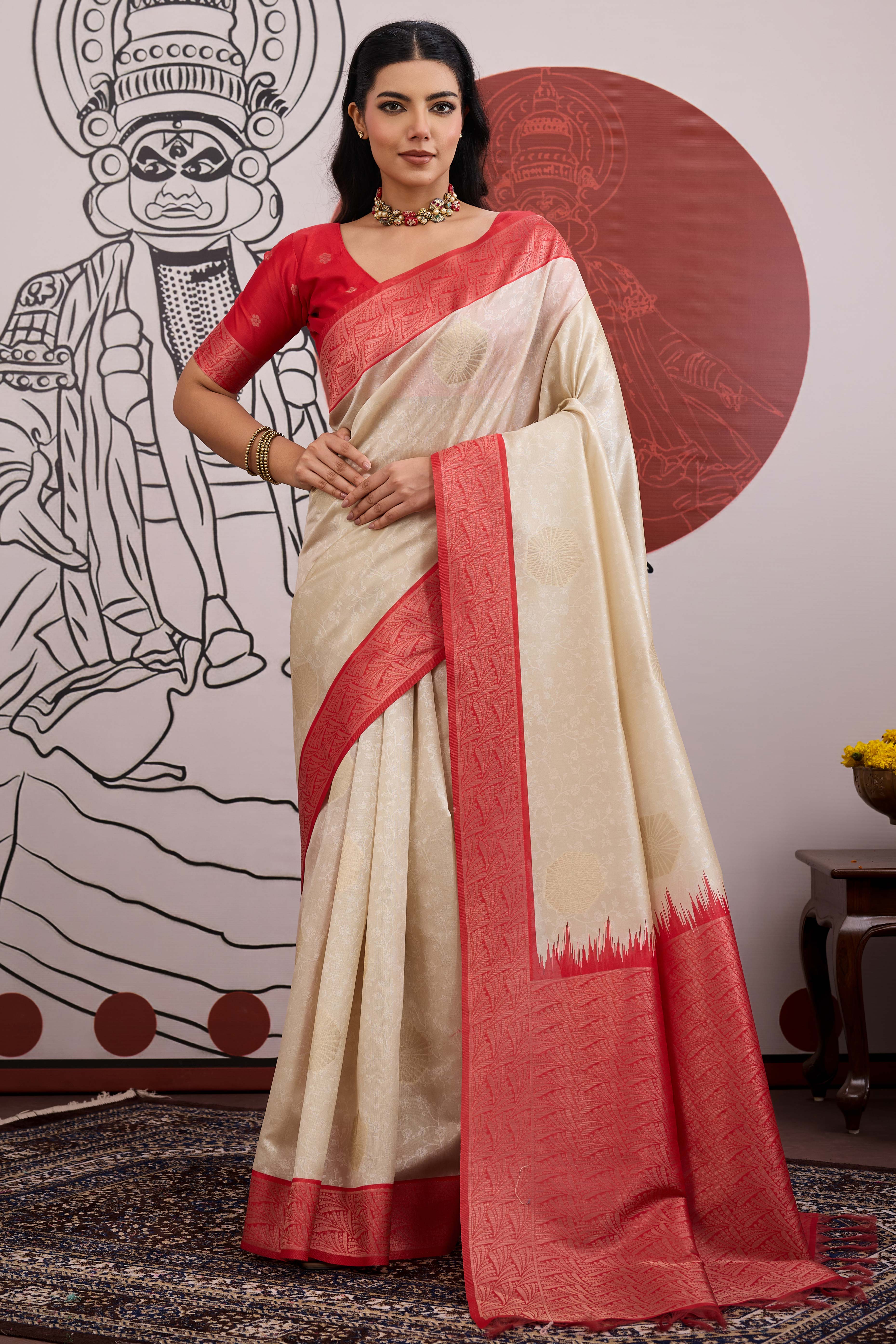 Graceful Cream & Red Zari Weaving Silk Saree Highlighted By Decorative Tassel Pallu