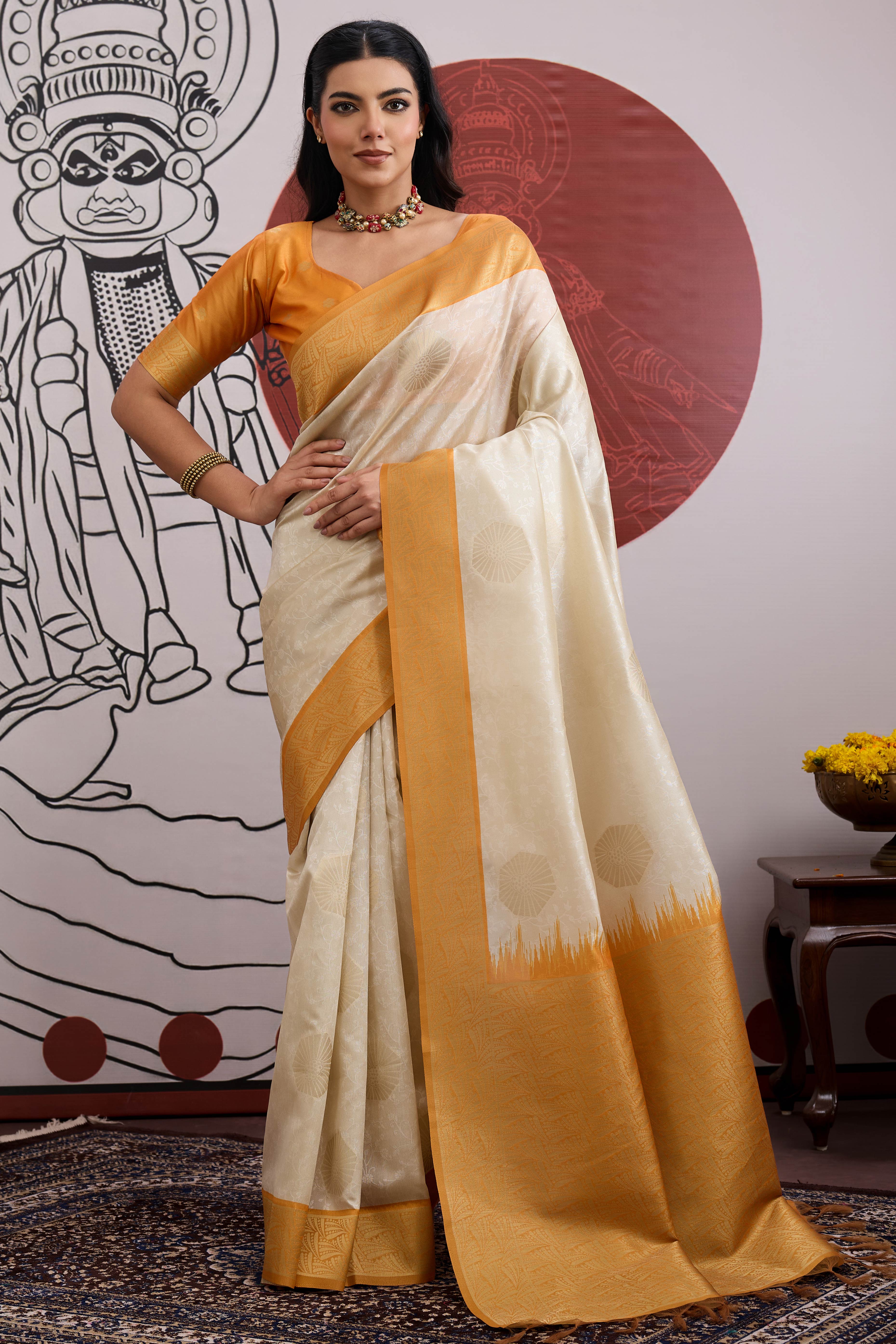 Graceful Cream & Mustard Zari Weaving Silk Saree Highlighted By Decorative Tassel Pallu