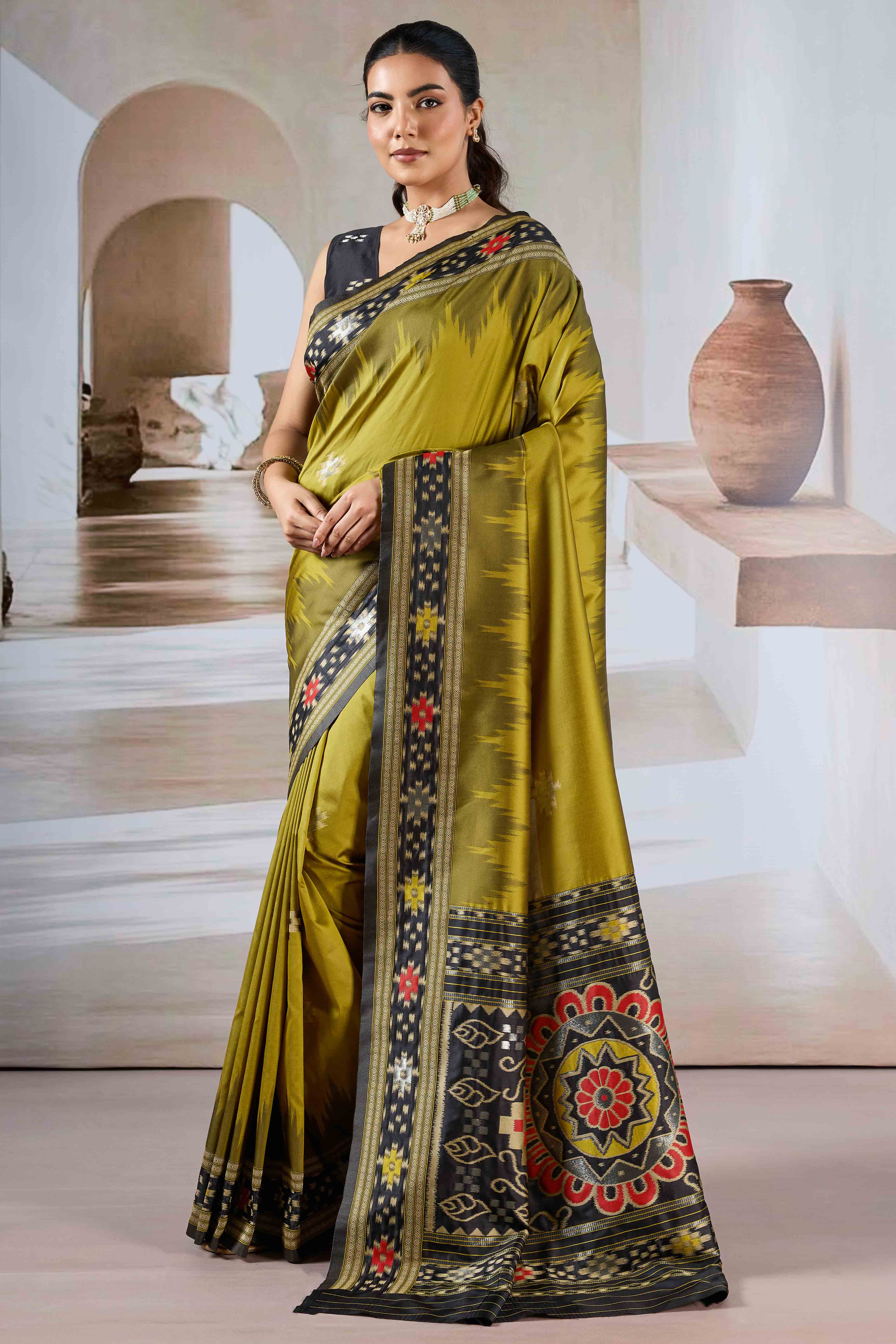 Olive Art Silk Saree Adorned with Intricate Patola Style Woven Designs