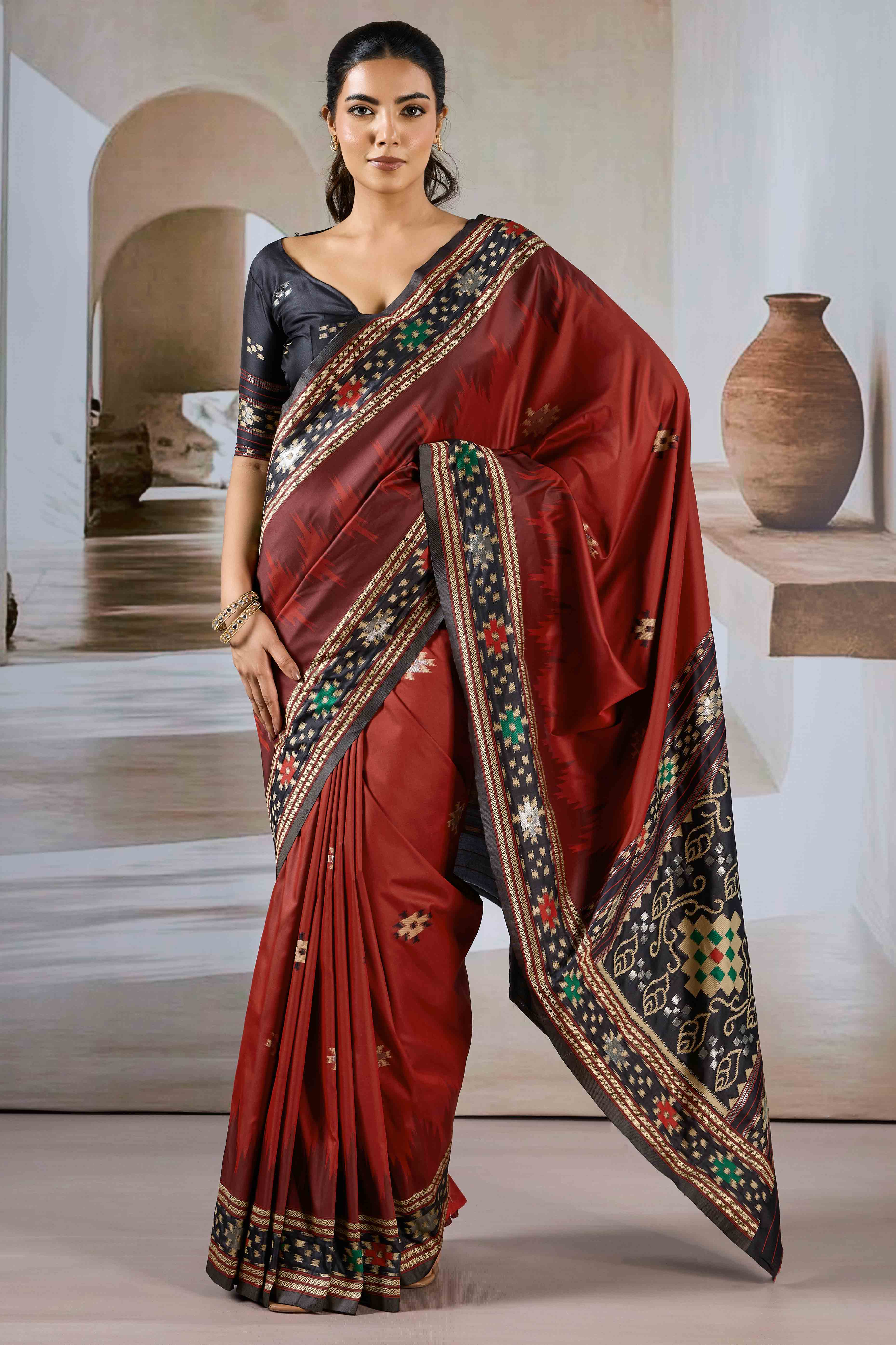 Maroon Art Silk Saree Adorned with Intricate Patola Style Woven Designs