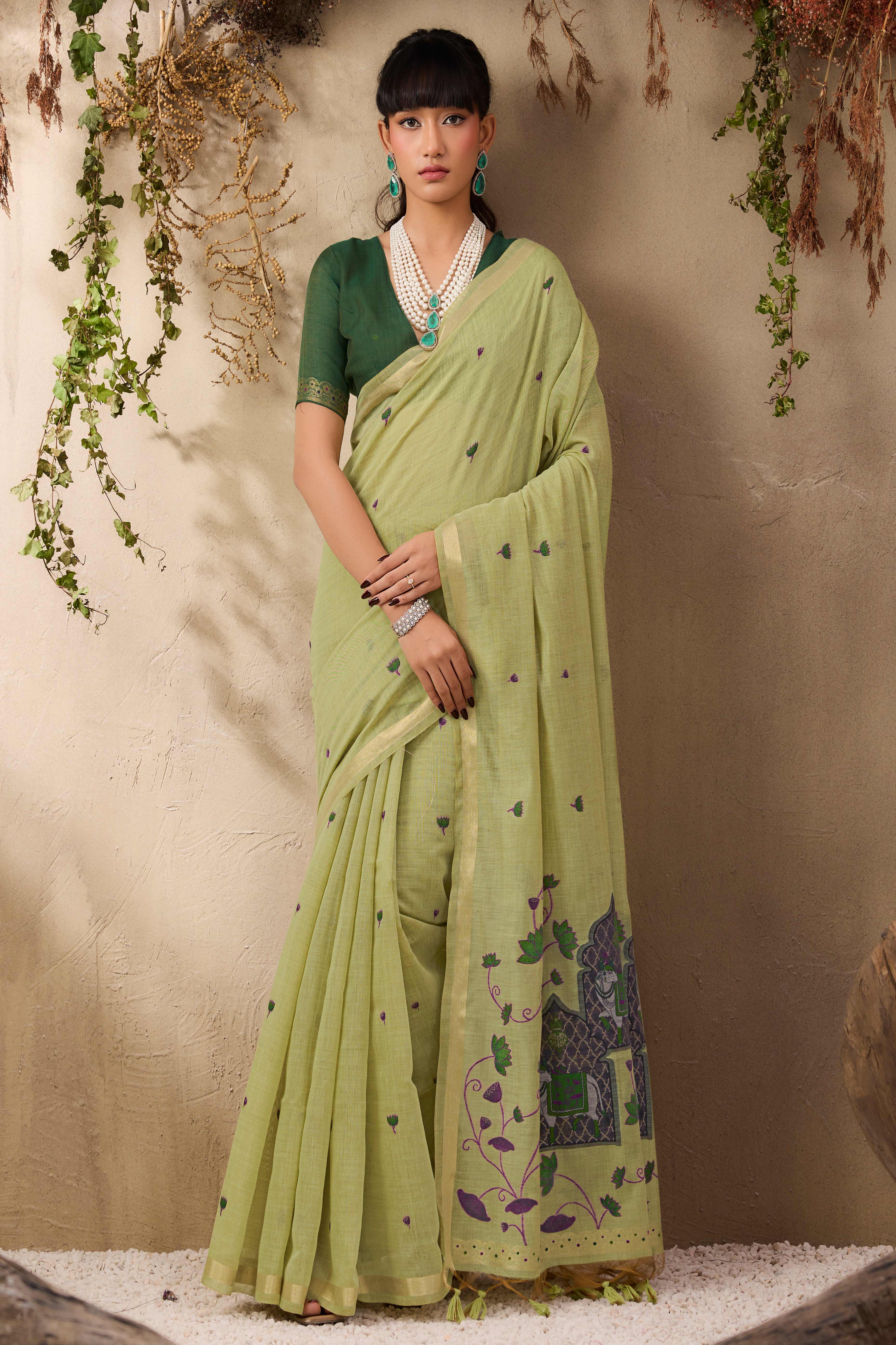Green Lightweight Handloom Munga Cotton Blend Saree Accented with Floral Woven Motifs