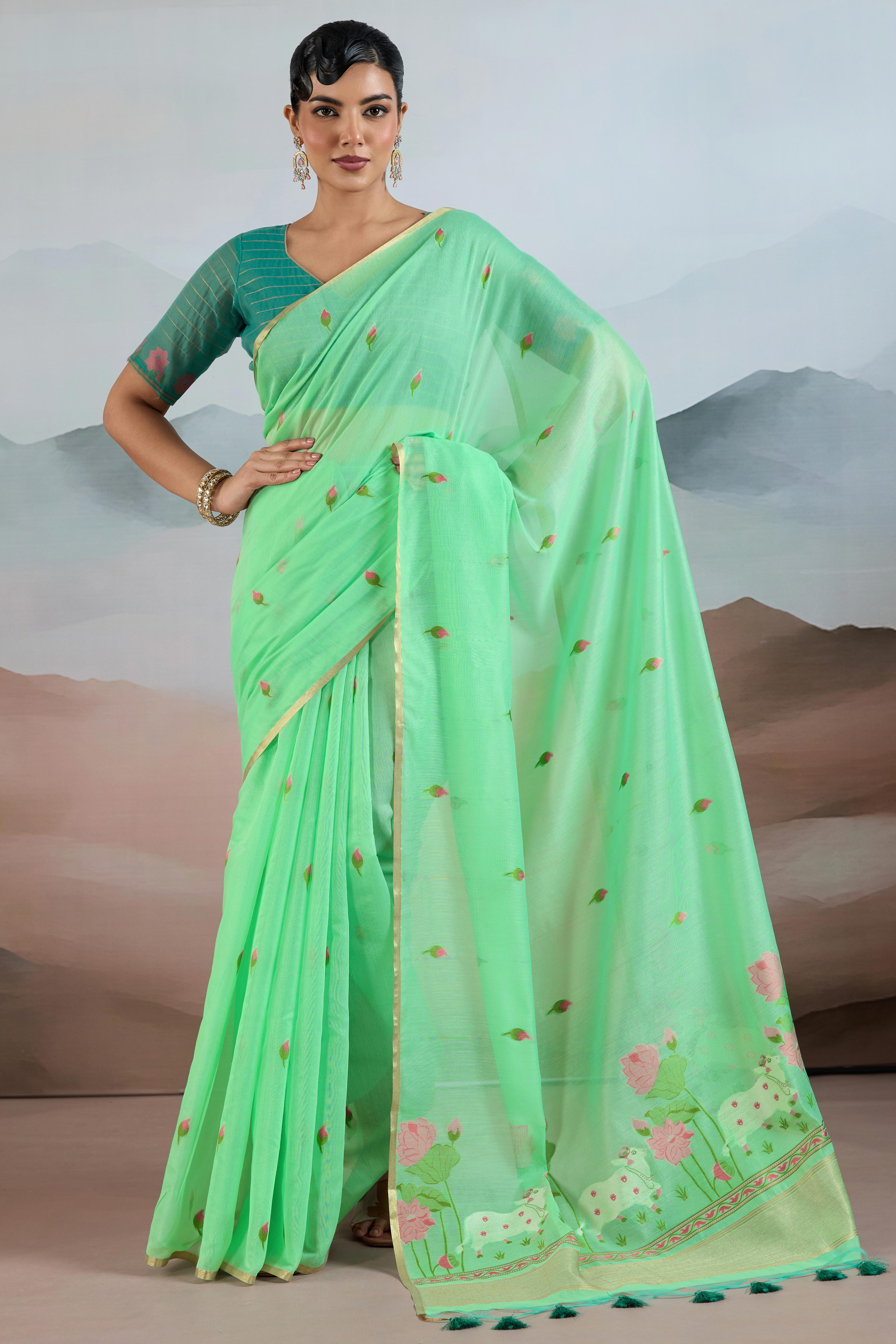 Trendy Sea Green Cotton Blend Weaving Saree Showcasing Floral & Animal Motif & Classic Tassel Pallu
