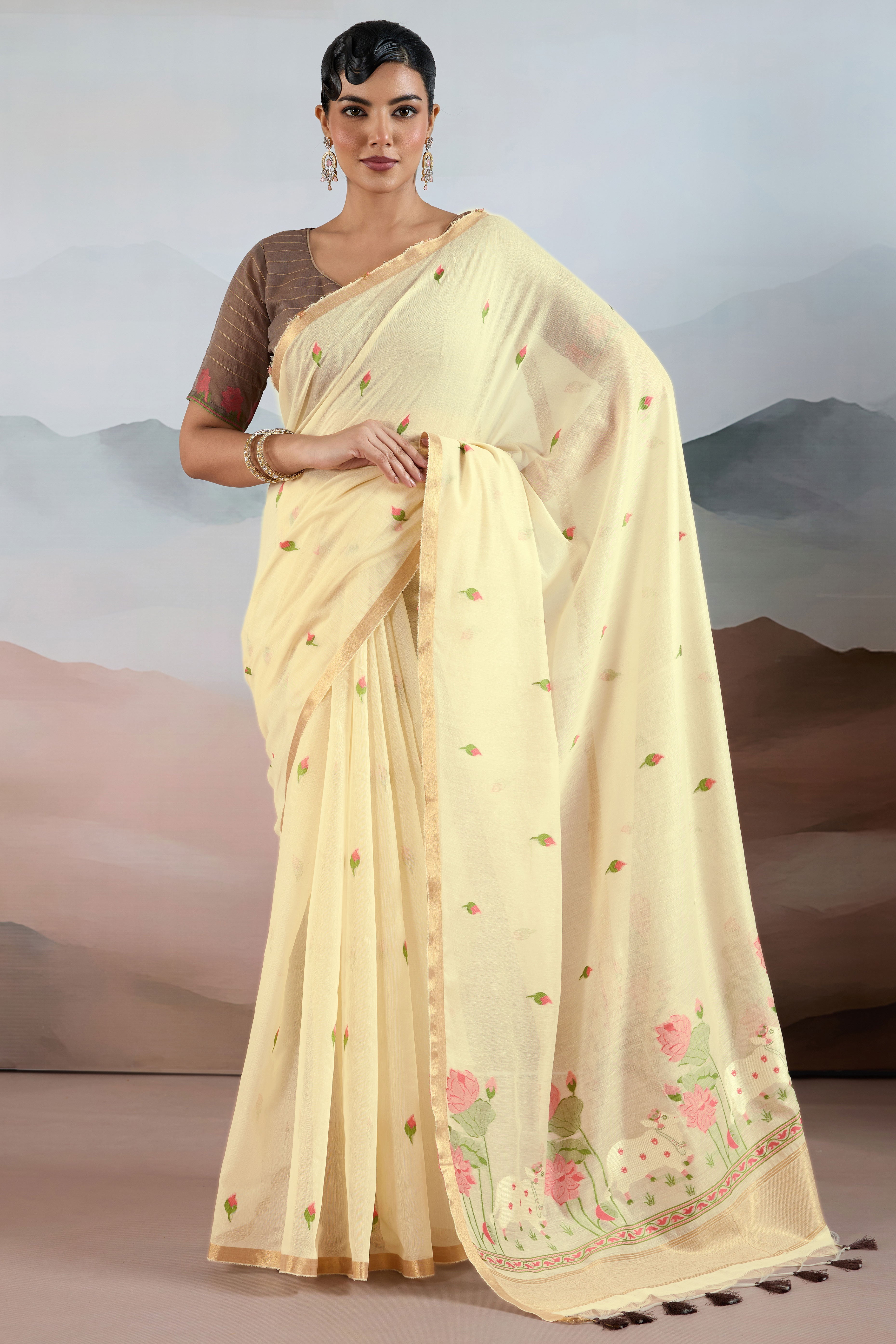 Trendy Cream Cotton Blend Weaving Saree Showcasing Floral & Animal Motif & Classic Tassel Pallu