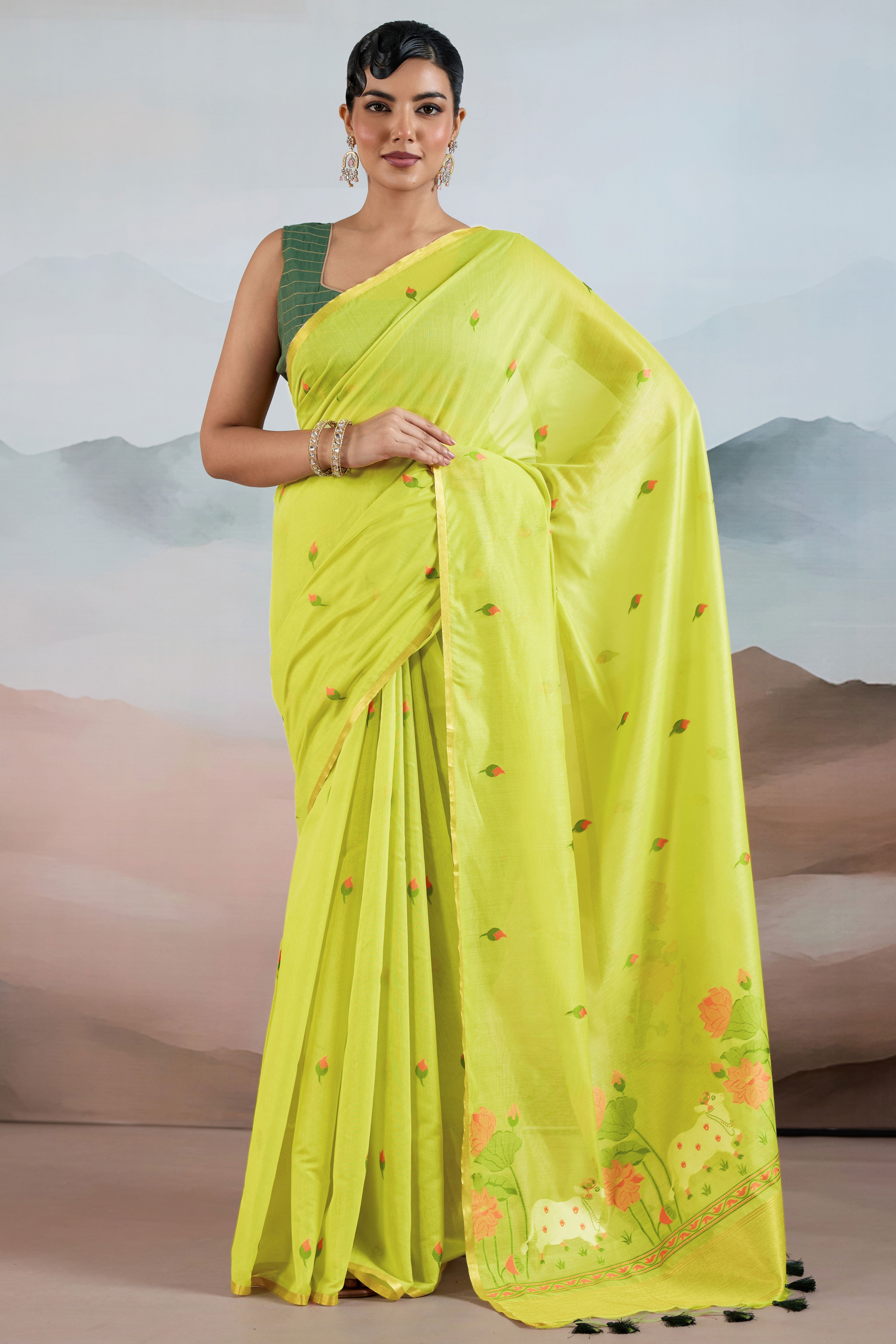 Trendy Green Cotton Blend Weaving Saree Showcasing Floral & Animal Motif & Classic Tassel Pallu