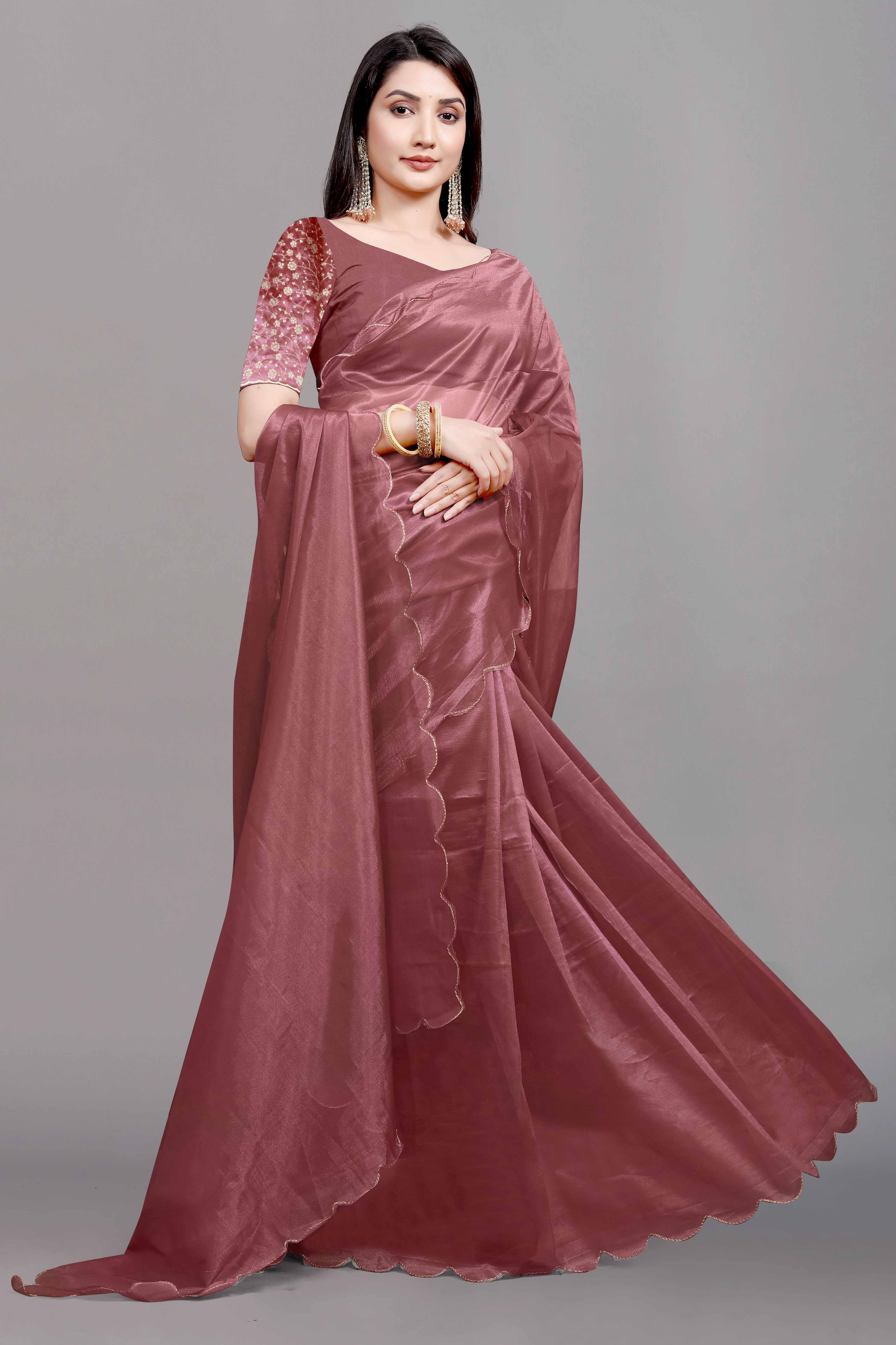 Rust Solid Net Saree With Zari Border