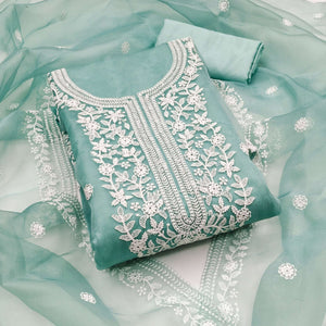 Unleash Your Style With This Turquoise Floral Thread Embroidered Organza Dress Material
