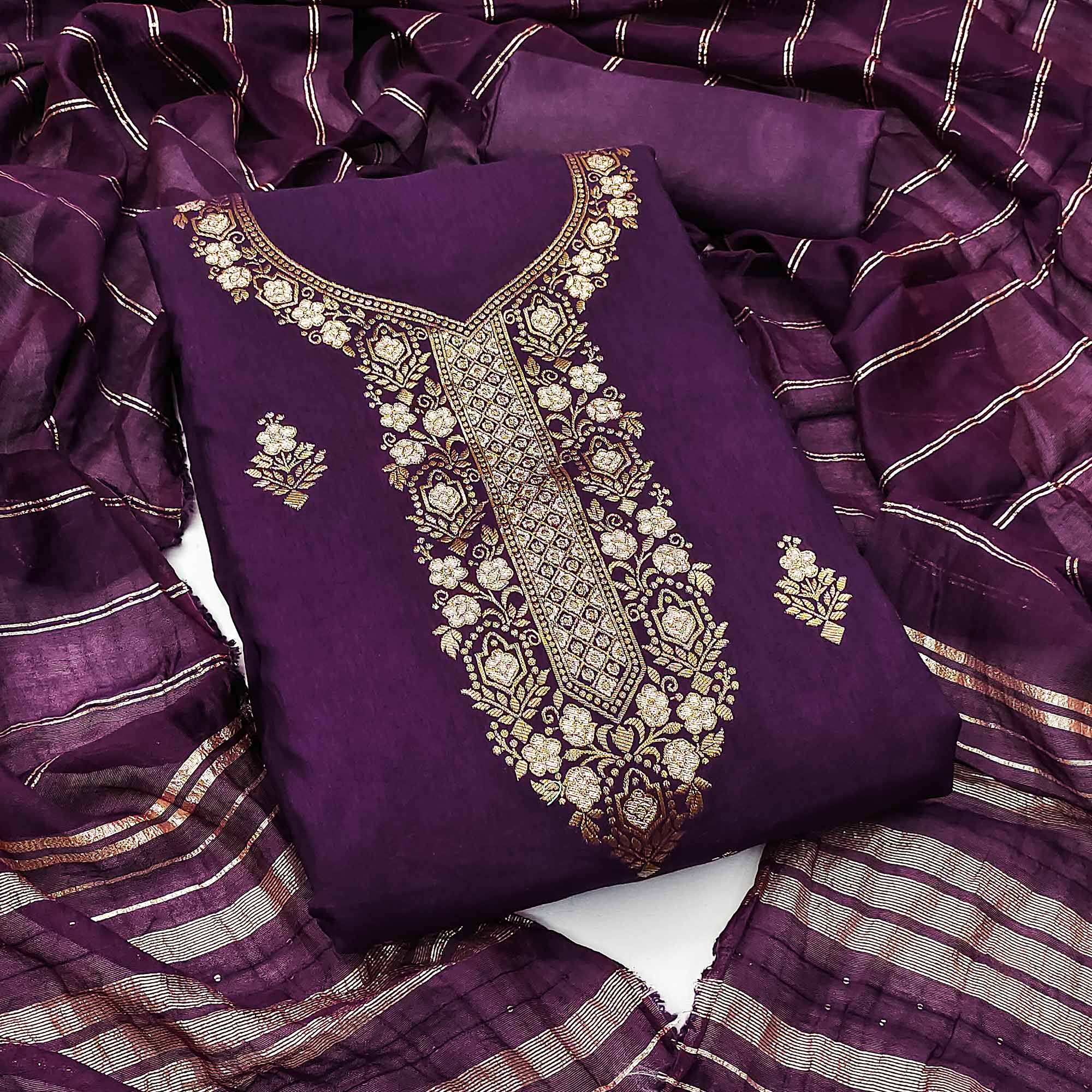 Elegant Royal Wine Banarasi Jacquard Dress Material Adorned With Ornate Zari Floral Weaves