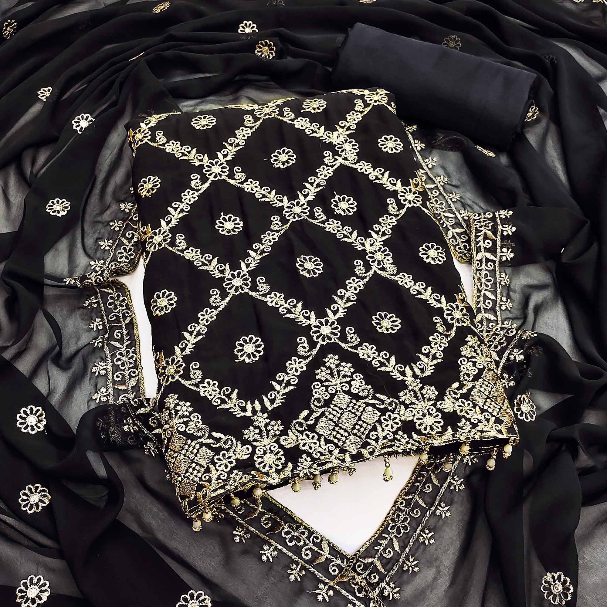 Black Georgette Dress Material Adorned With Floral Zari Embroidery Work