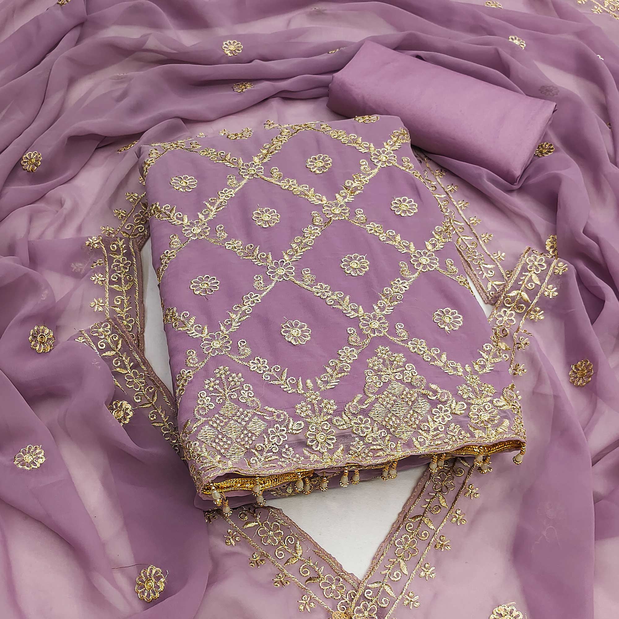 Orchid Purple Georgette Dress Material Adorned With Floral Zari Embroidery Work