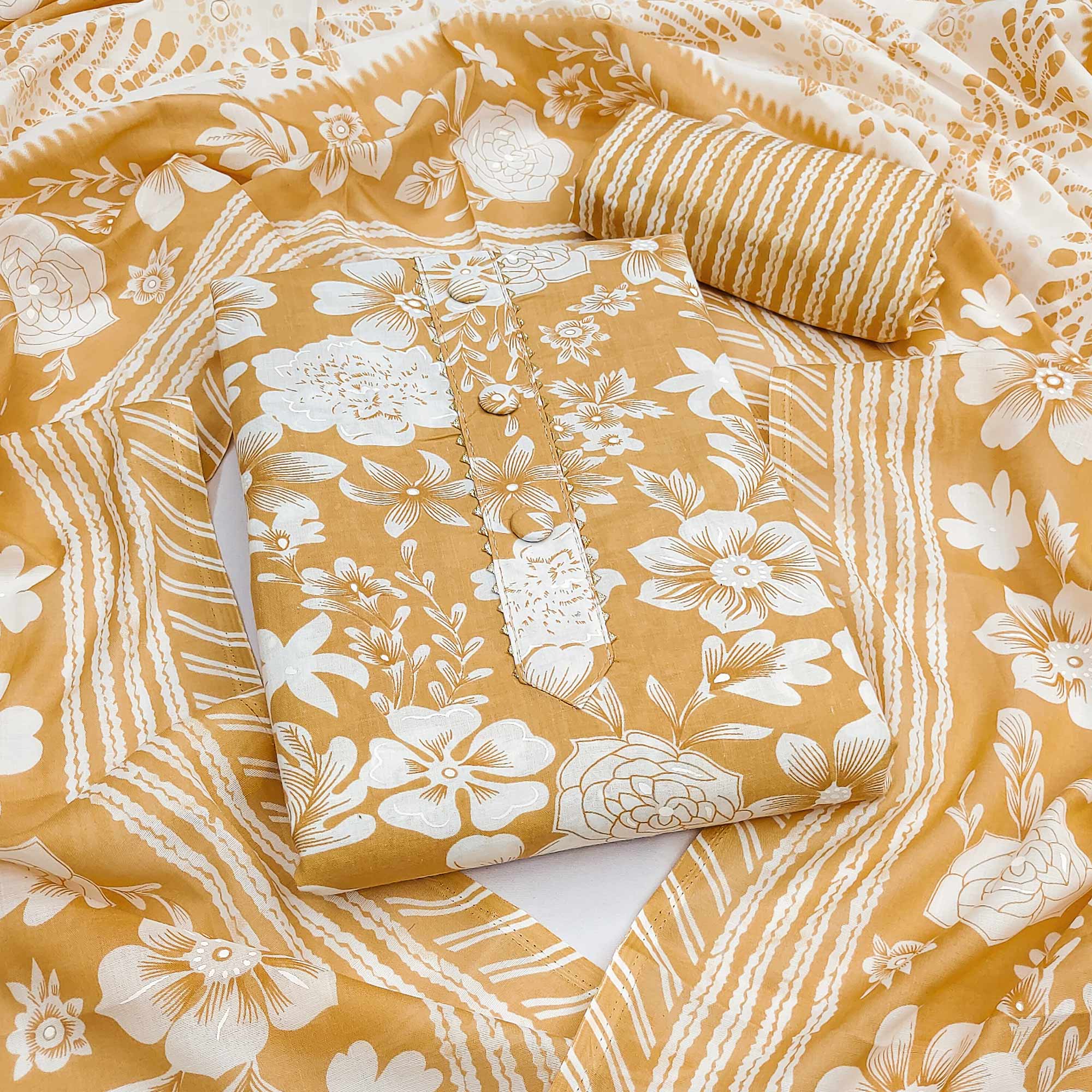 Chikoo Floral Printed Pure Cotton Dress Material With A Fresh Elegant Appeal