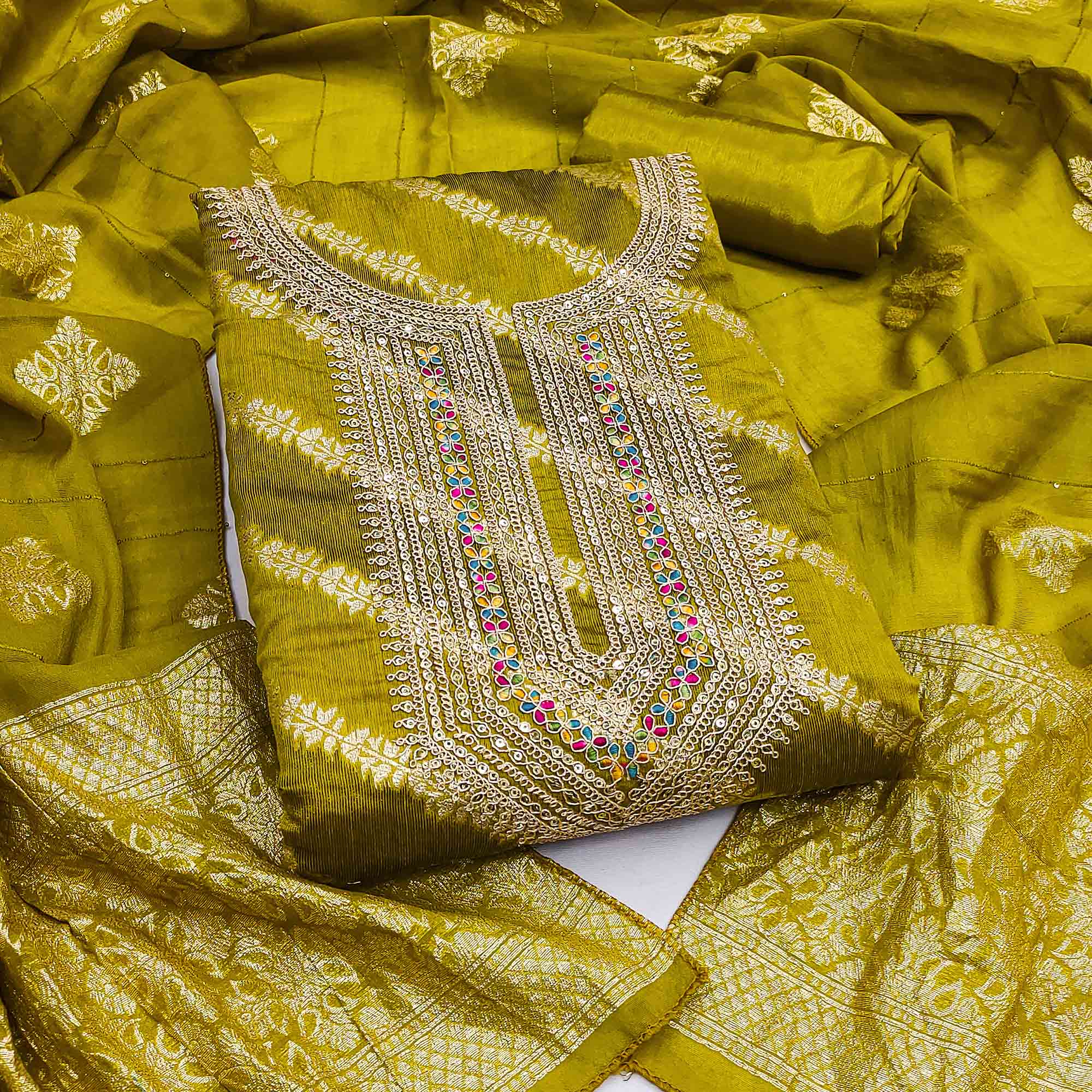 Rich Green Banarasi Silk Dress Material Featuring Floral Weaving & Neck Cording Embroidery